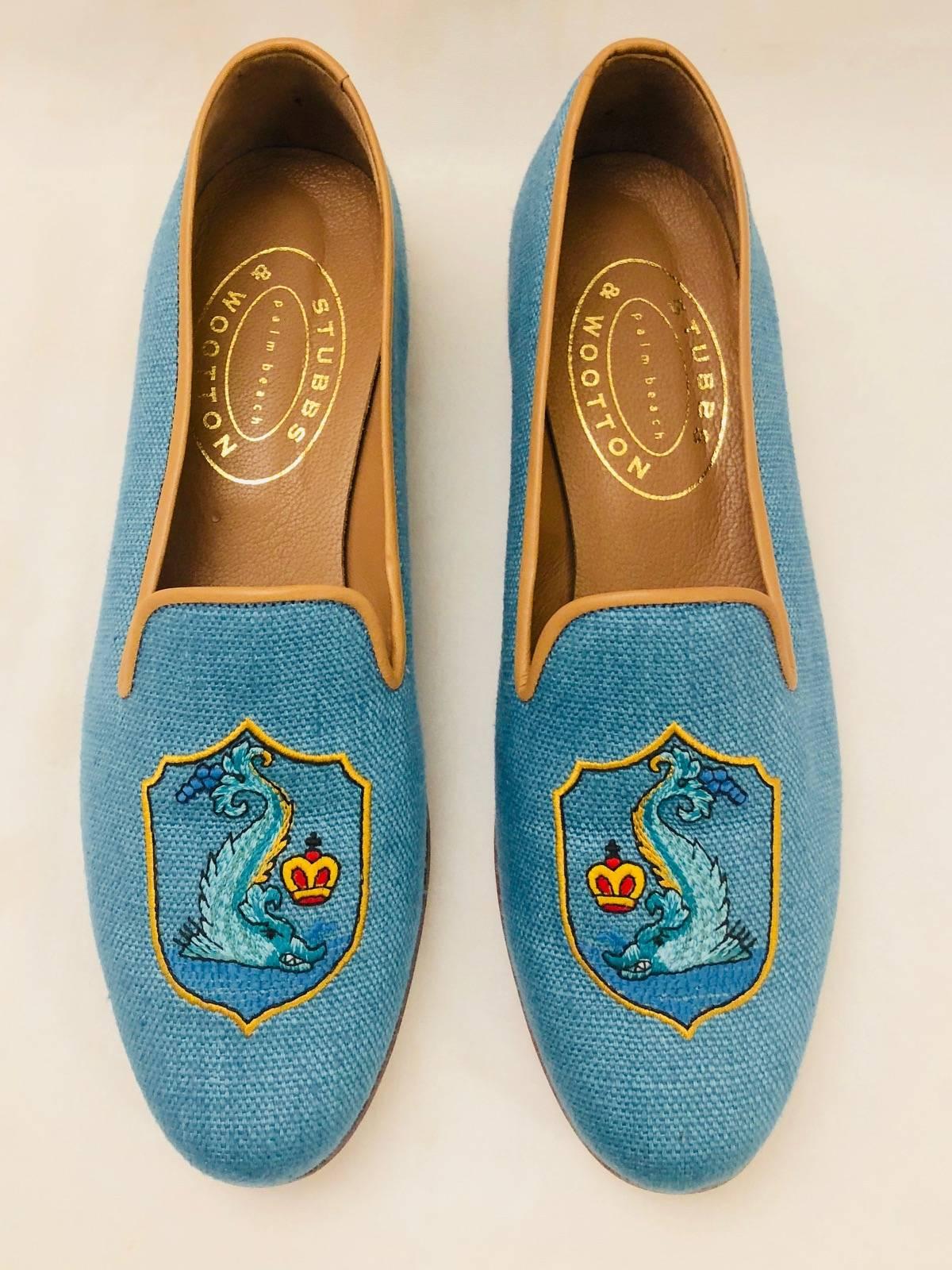 Renowned footwear in and out of Palm Beach, these Stubbs & Wootton Slippers are simply a must for any connoisseur of these fine footwear.   Crafted in Spain, these signature needlepoint fabric shoes feature a tempting shade of light turquoise and