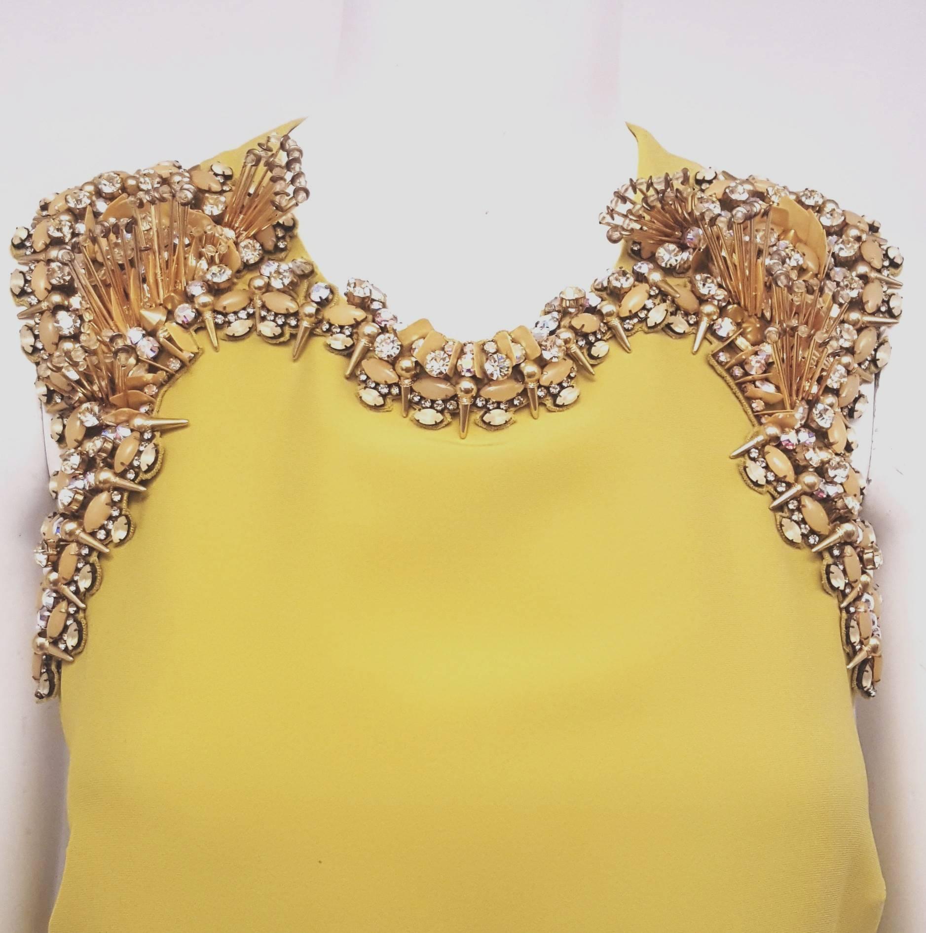 Gucci razorback A-line chartreuse silk dress contains detailed and elaborate gold tone beaded accents at shoulders and around the round neckline, that can be removed when cleaning the dress.   The rare combination of so many different beads and