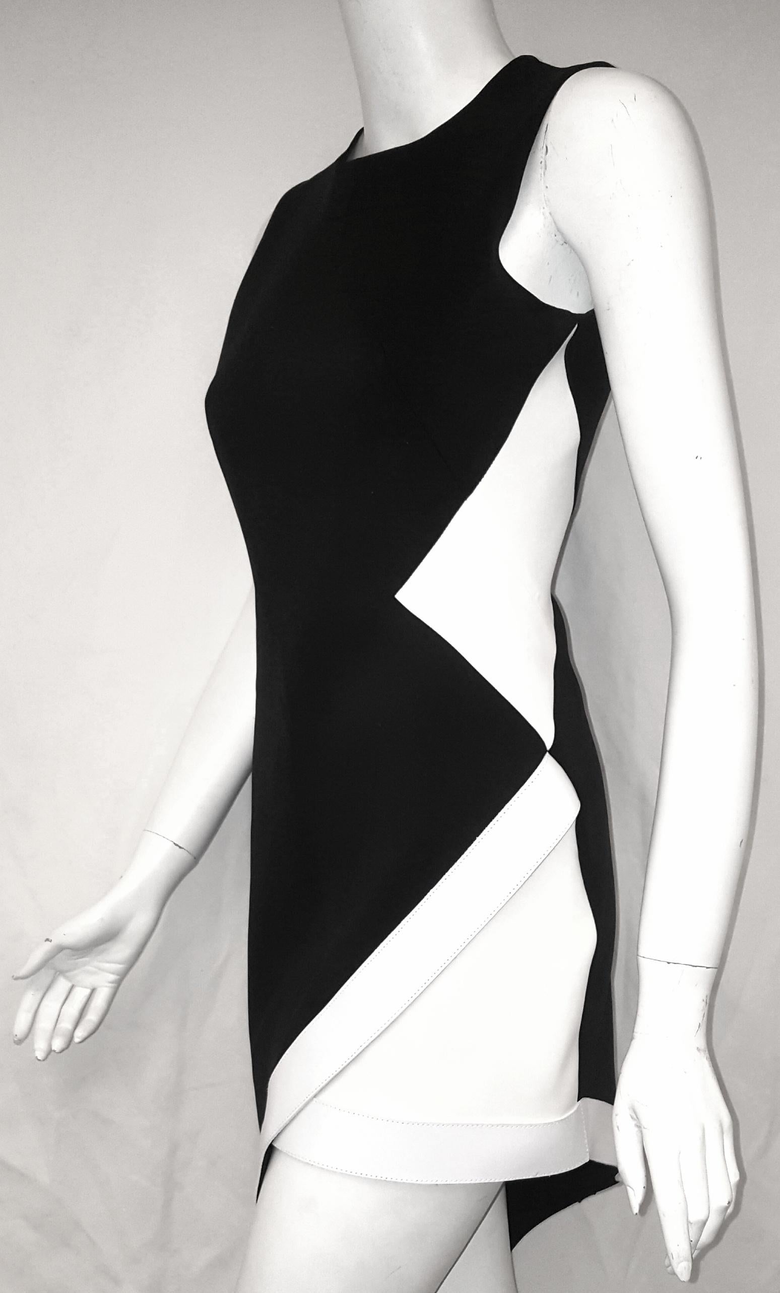 David Koma black & white viscose and leather trim dress from the spring/summer 2014 collection was a standout in a Japanese inspired collection of sharp tailored dresses.  David Koma commented that he was moved by the mysterious and unusual Japanese