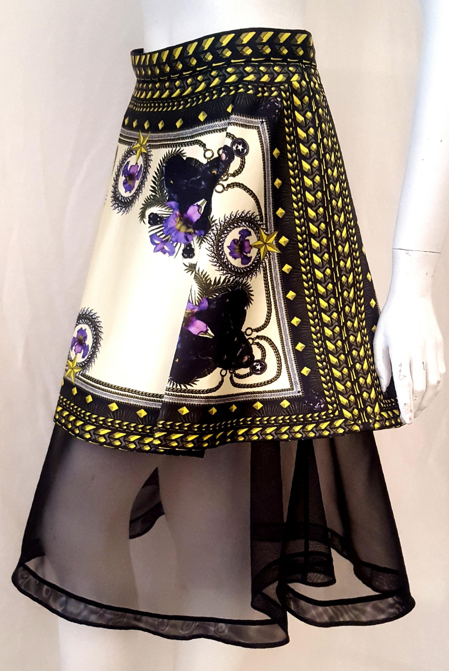 Givenchy cotton blend white base fabric with black panthers and lavender orchids around the bell shape skirt from the 2011 collection, showcasing the black and gold tone chain design around the waist and the hem of the skirt.   The under skirt is