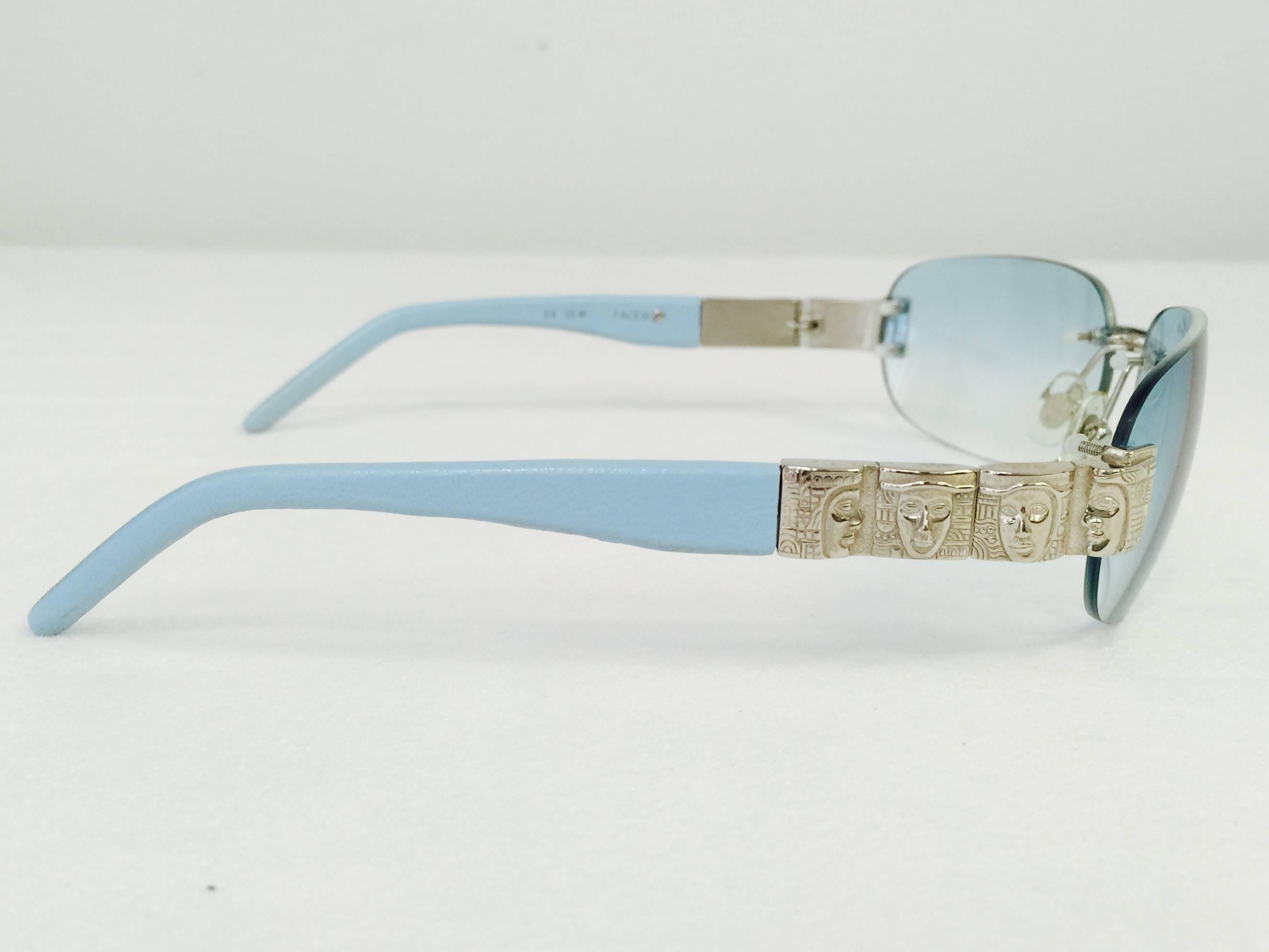 New Face III Sunglasses are highly desired by connoisseurs of all things Barry Kieselstein-Cord!  Features a most feminine powder blue lens and frame.  Silver tone hardware.  Not too dark.  Not too light.  These may be worn day or night!  The piece