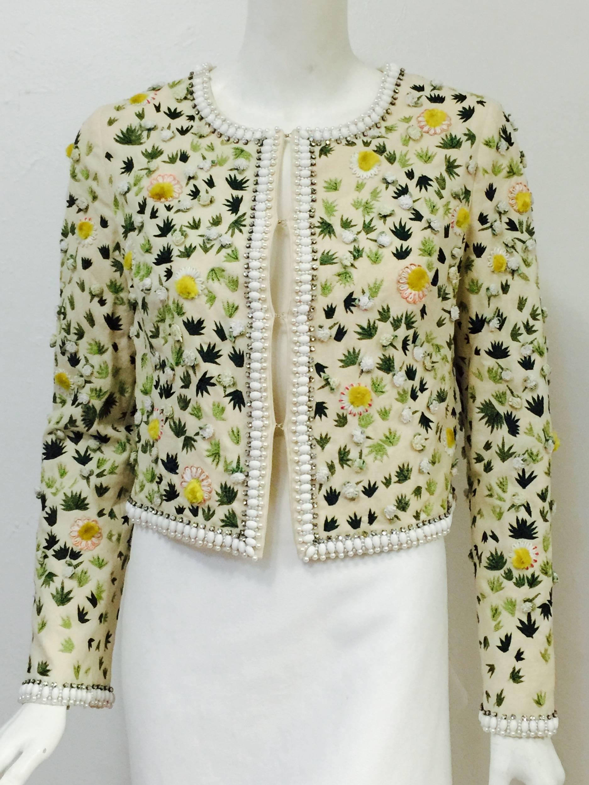 Embroidered Cropped Cotton Jacket by Blumarine merges elevated craftsmanship and couture techniques with ready-to-wear sensibility!  Features luxurious 100% cotton shell and 100% sheer silk lining.  The showstopper?  Exquisite three-dimensional