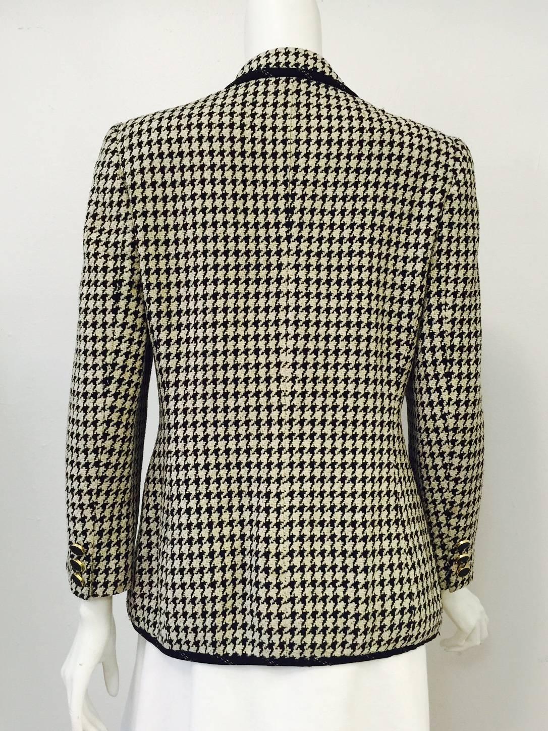 1990s Escada by Margaretha Ley Jacket proves that cozy and comfortable can be chic!  Features luxurious black and tan wool blend hounds tooth chenille fabric, five-button closure and three-button sleeves. Four front pockets have working buttons. 
