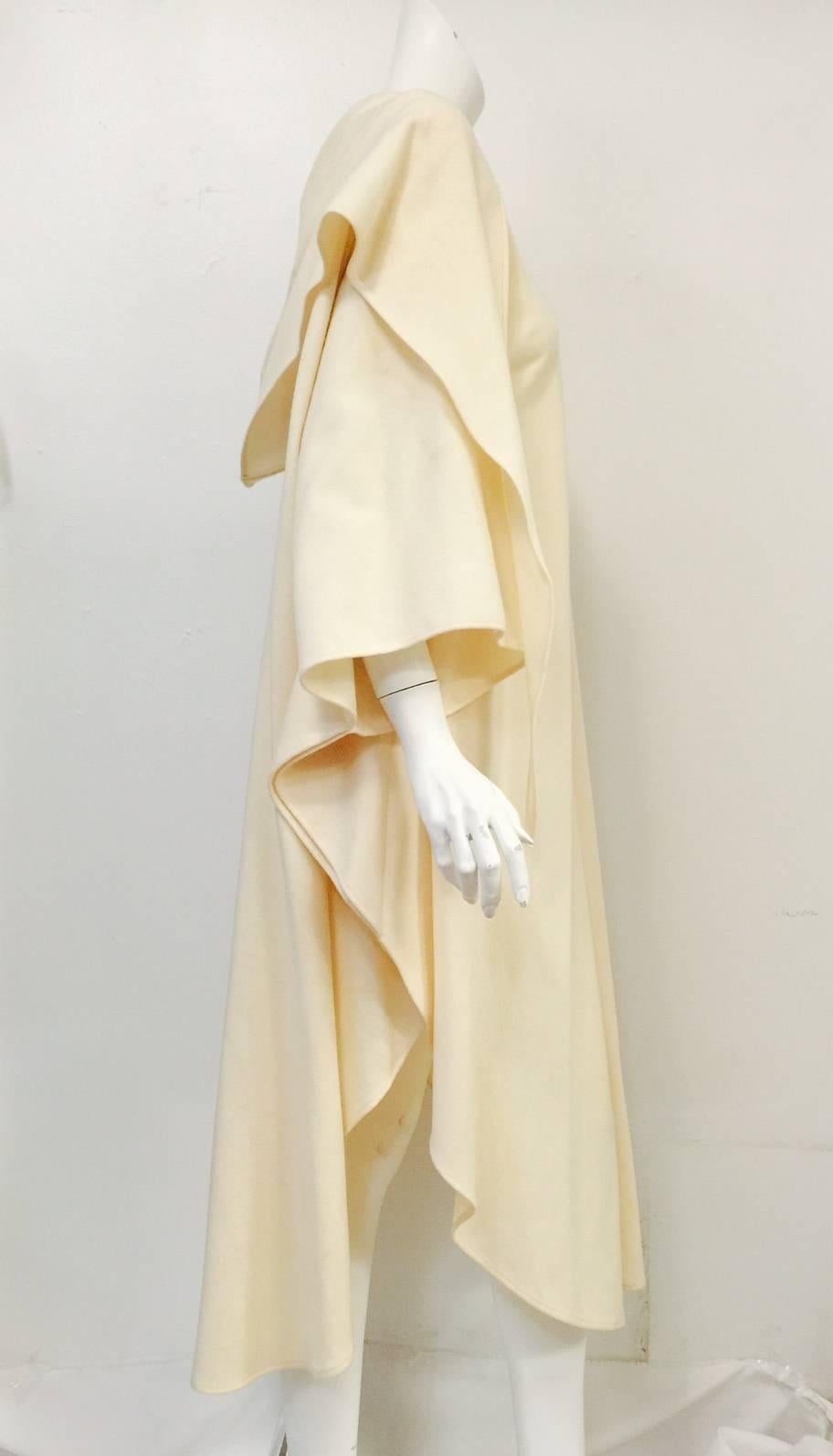 Ivory 100% Wool Coat illustrates why Yeohlee Tang's designs have earned a permanent place in the Costume Collection at the Metropolitan Museum of Art!  The word 