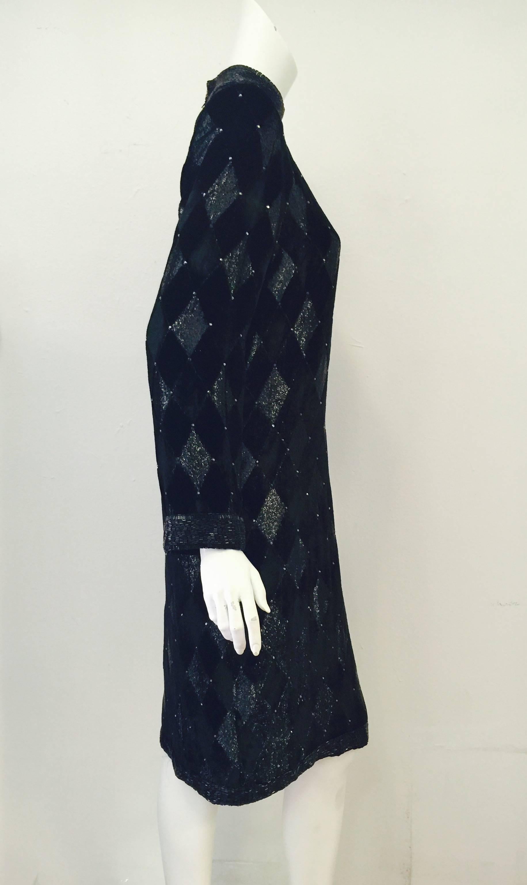 Vintage Bob Mackie Black Velvet Sheath is worthy of Mackie's archives and The Costume Institute.  Sophisticated knee length dress features harlequin design all over crafted from a most luxurious velvet and metallic eyelash fabric.  Beautiful black