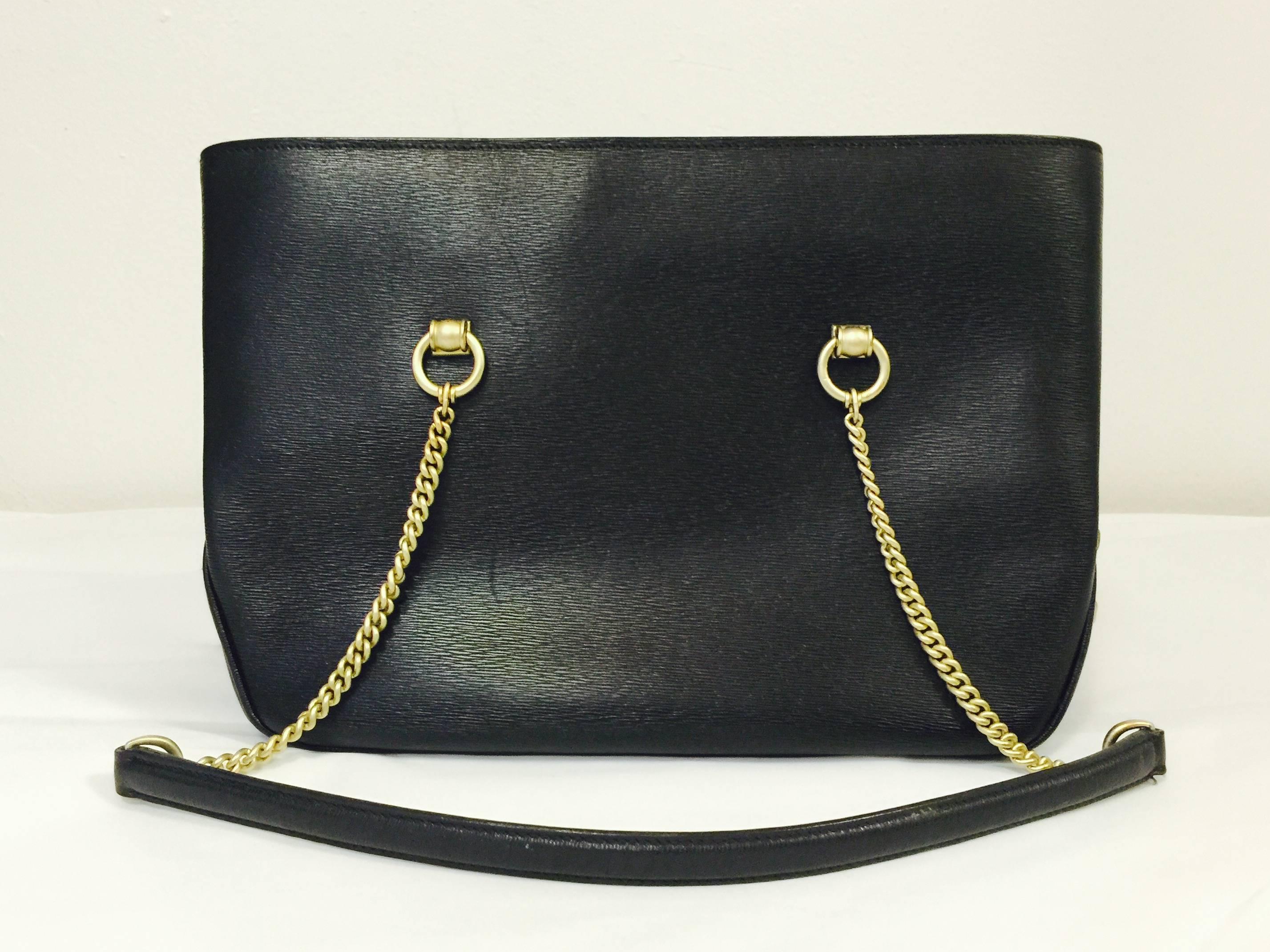 Barry Kieselstein Cord Shoulder Bag is ultra-luxurious with the just the right amount of whimsy!  Features classic design and top zippered center compartment closure.  Two additional open compartments offer convenience and maintain order!  Matte