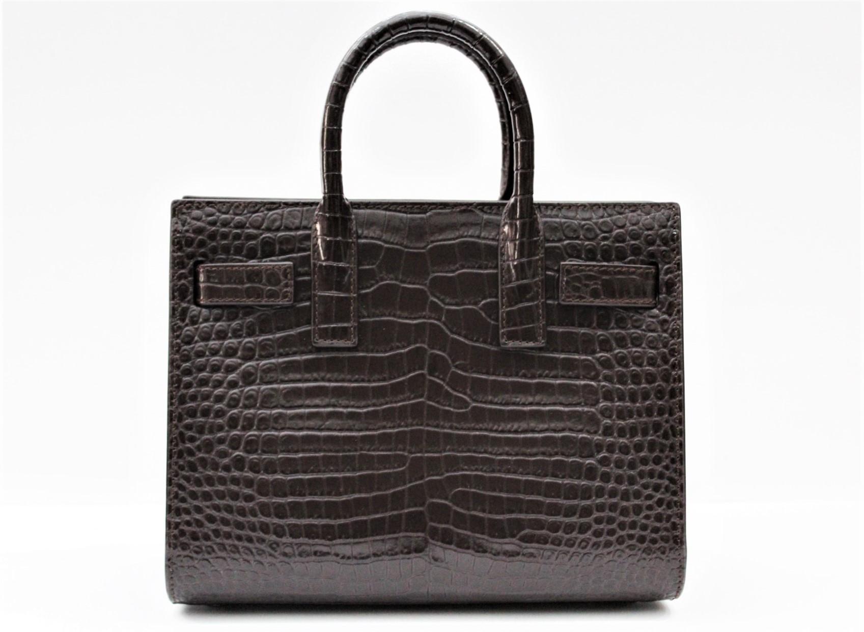 Signature Saint Laurent bag with round sleeves, accordion sizes, compression straps with linguette and adjustable and removable shoulder. Perfect conditions.