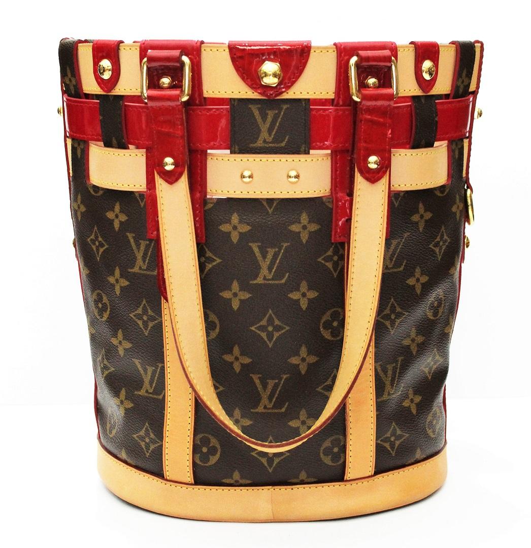 Released as a part of the Cruise 2008 Collection, the Monogram Canvas Rubis Neo Bucket Bag features vachetta leather, Monogram Canvas and red crocodile embossed patent leather intertwined to create a surprising take on the classic bucket bag. Shiny