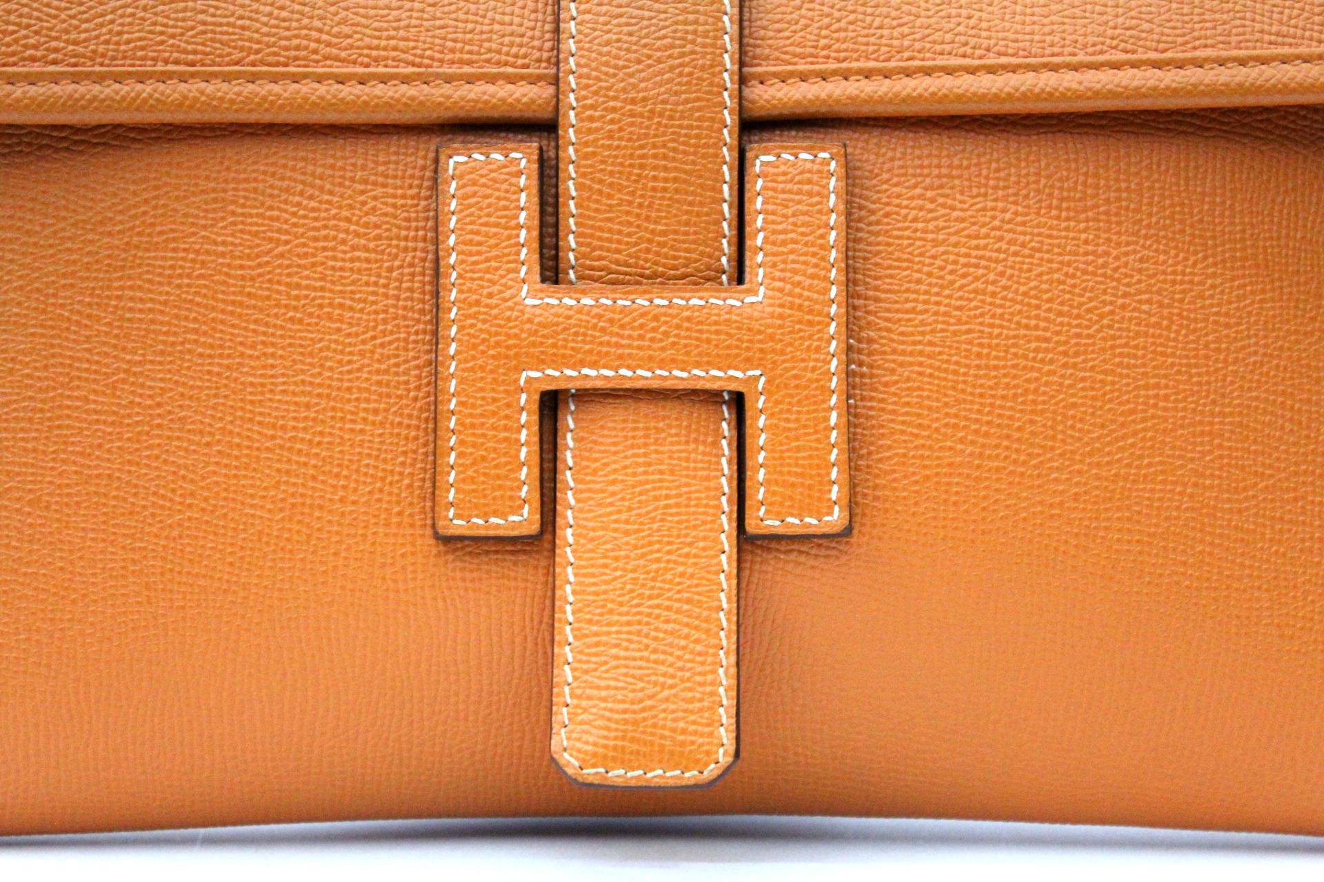 Beautiful Hermes Hermes clutch Jige model in orange Epson leather.

Year 2009
