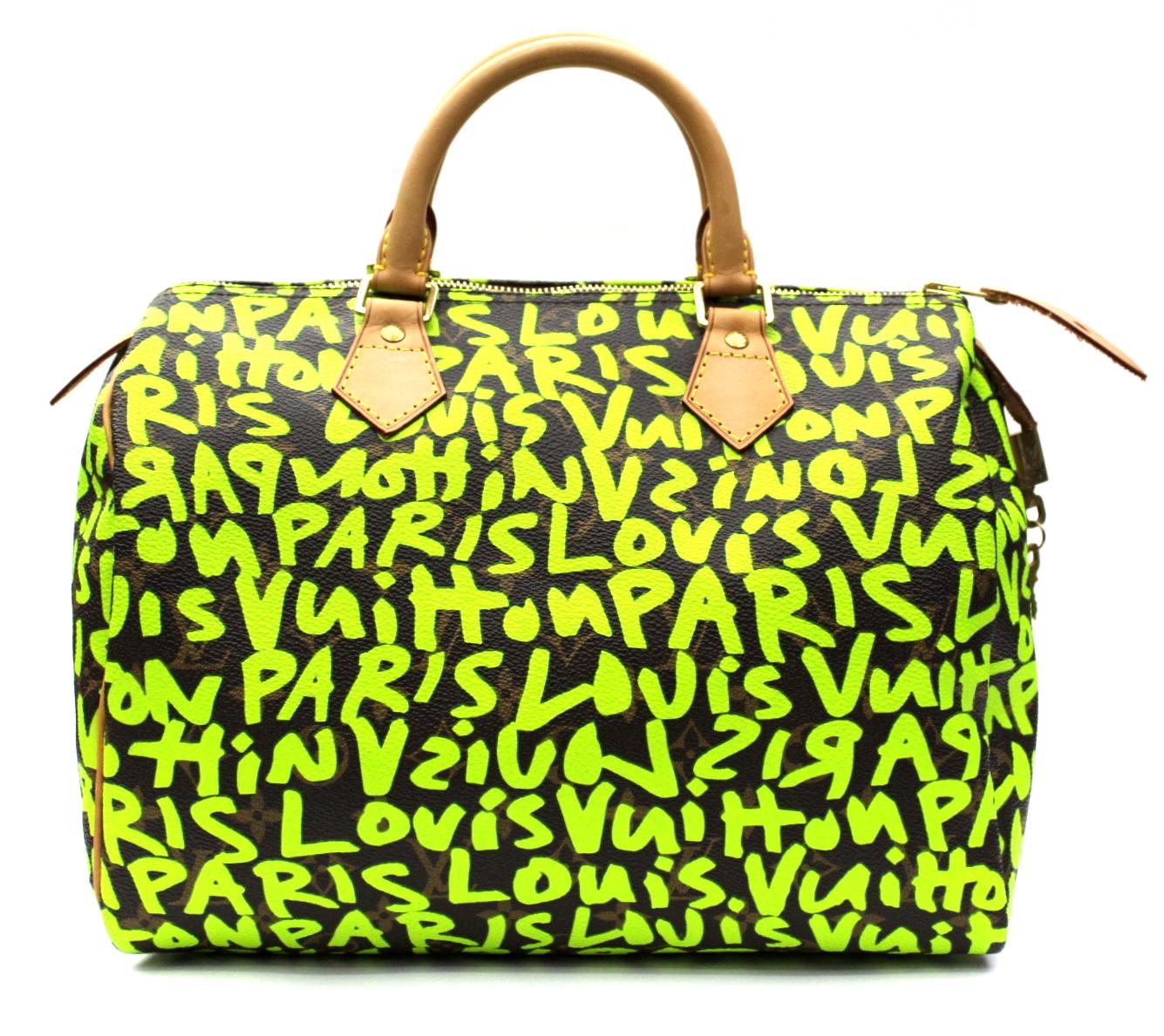 This limited edition Louis Vuitton Graffiti Sprouse Speedy 30 presents the monogram canvas with the iconic pattern covered with fluorescent graffiti. The Speedy was designed after the iconic Keepall and has always been popular. With its