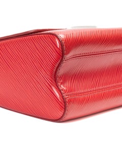 Louis Vuitton Twist MM en cuir Epi fuchsia