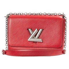 Louis Vuitton Twist MM en cuir Epi fuchsia