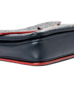 Louis Vuitton Metis MM Empreinte Clutch in Blue