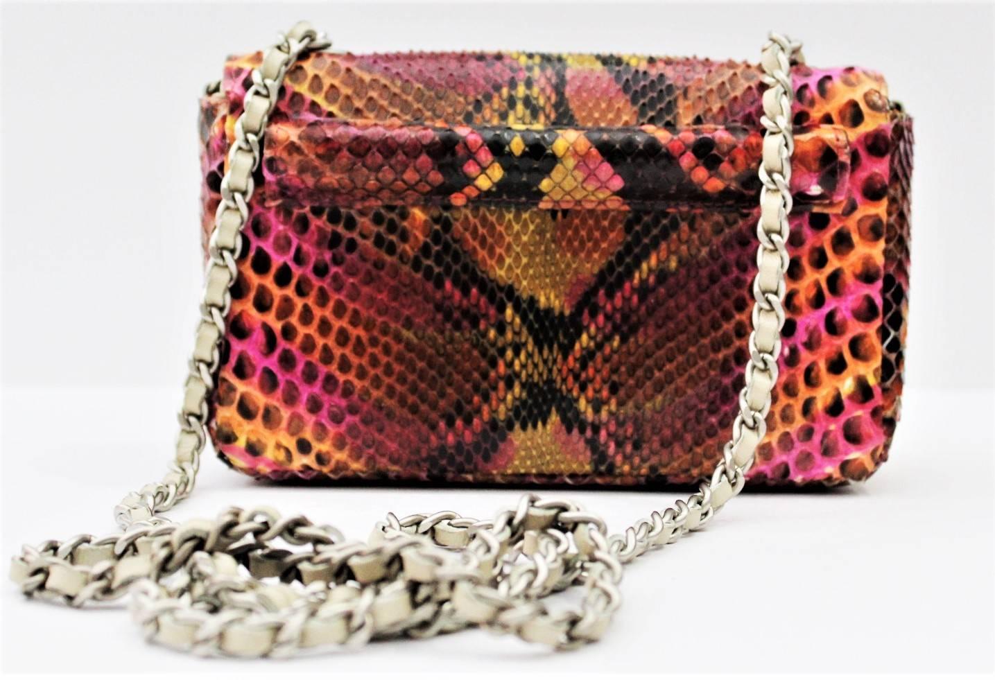 Adorable Chanel bag in a  mini size realized in multicolor python leather. You can wear it in various way :
crossbody
shoulder
clutch 
