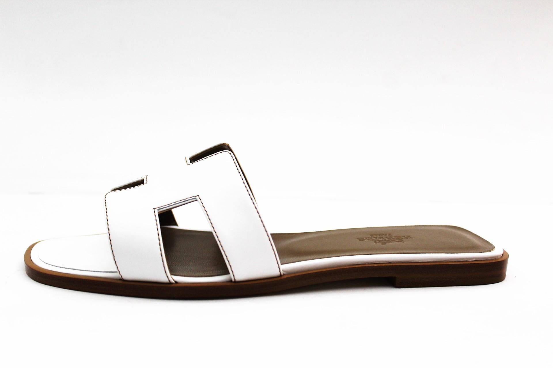 Hermes Oran sandals
New and never worn with box 
White and brown leather 
Size 37 1/2 EU