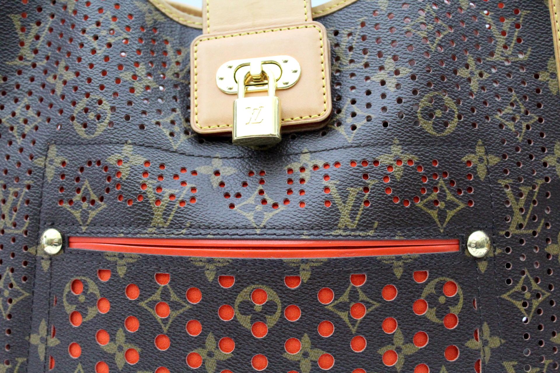 Don't miss out on your chance to own this spectacular and limited edition Louis Vuitton Orange Monogram Perforated Musette Bag. A definite fave for LV collectors everywhere, this lovely creation has the iconic monogram canvas that is perforated and