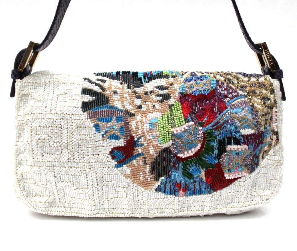This is a super Limited Edition about Fendi collection. The bag is covered with white and colored bead. 