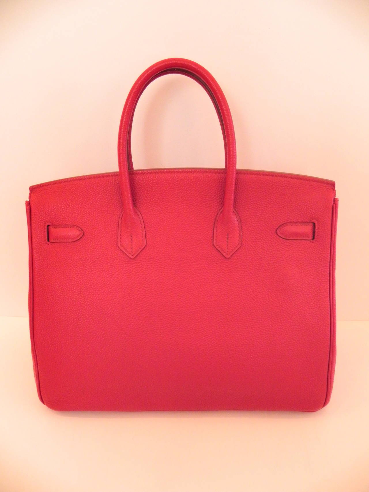Hermes Birkin 35 cm Red Rouge Garance Clemence bag .

Palladium Hardware .Excellent condition with no scratches or any wear at all .

Circa 2009-2010  M Square year   CO.3

Comes with original Hermes Dust bag and Box 

Rare in this color and