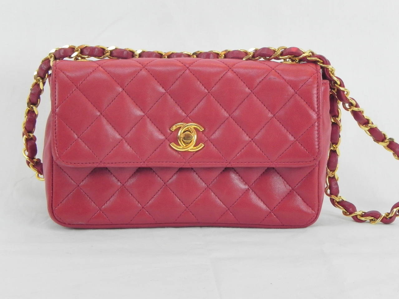 Classic Chanel Red Lamb skin 19 cm ,1980,s .

Very Good Condition with Chanel guarantee card .

Great Party bag and hard to find in Red !

Dimensions are 7 3/4 by 2 3/4 by 5 3/34 Inches .

Dust Bag included