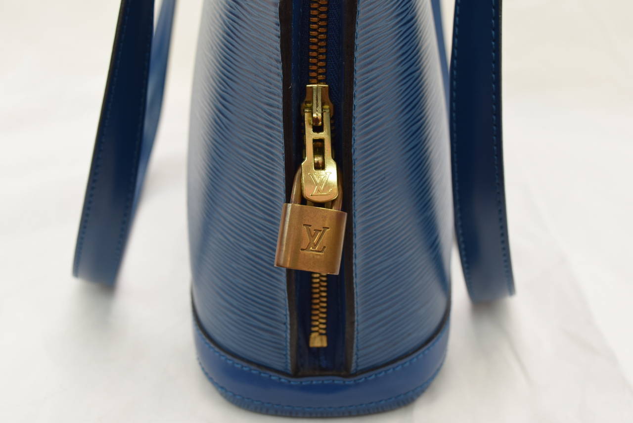 Louis Vuitton Epi Blue Lussac Bag .Circa :1995 :Discontinued Model In Excellent Condition In New York, NY