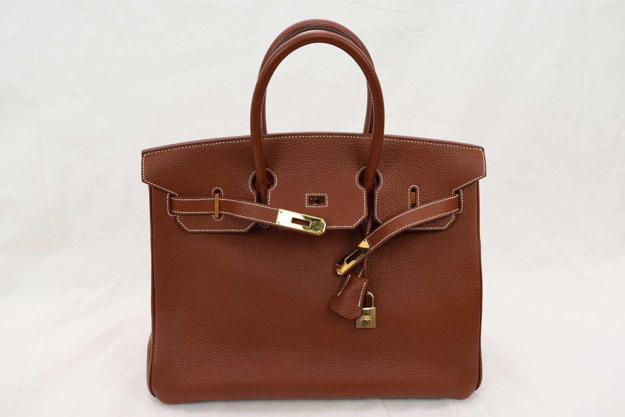 Hermes Birkin 35 cm Brown Taurillion Clemence Bag :Circa 2001
E Square Year .Comes with Original Dust bag .Gold Hardware.
Bag is in 
