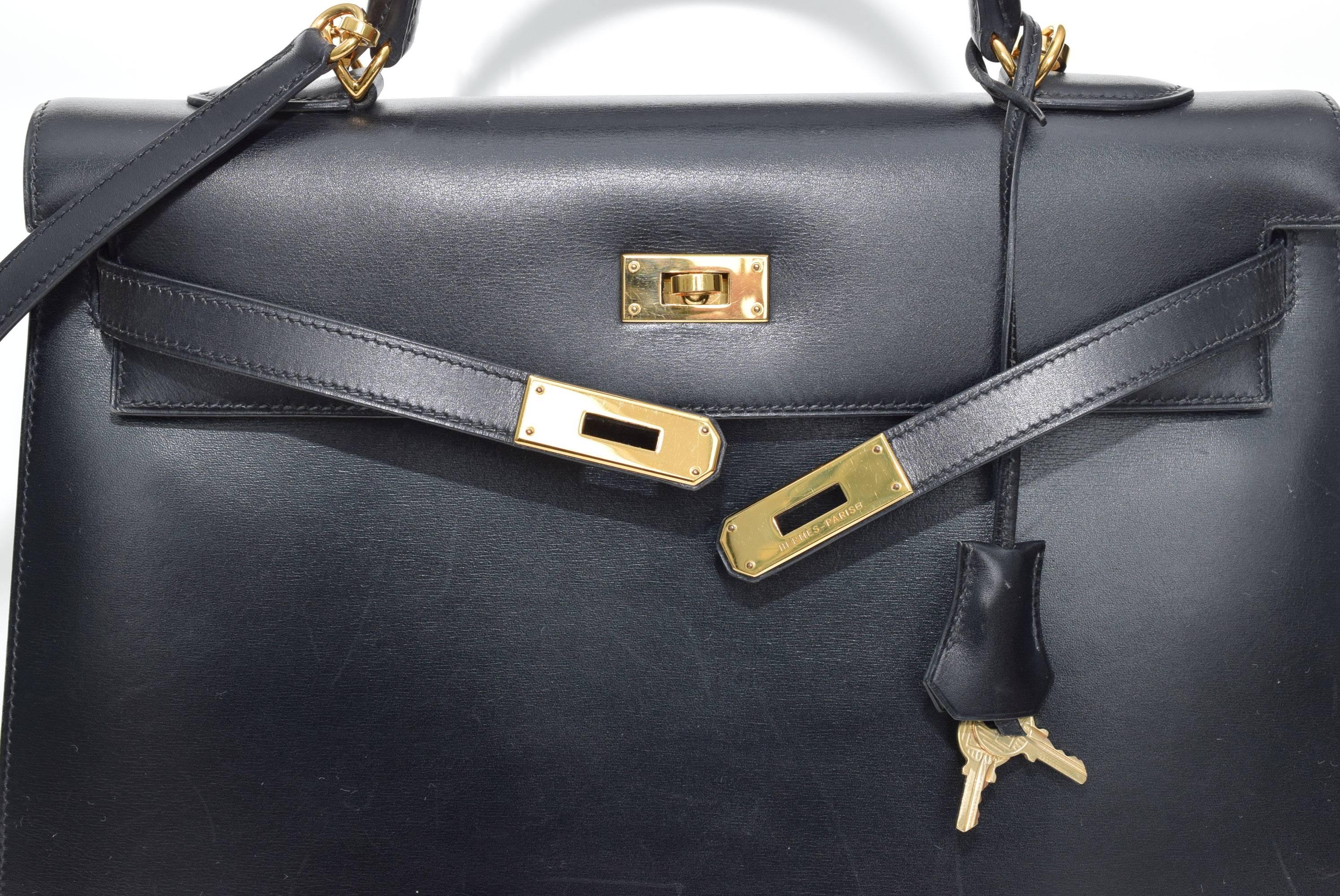 Herrmes Black Kelly 35cm in box leather with gold hardware. 5