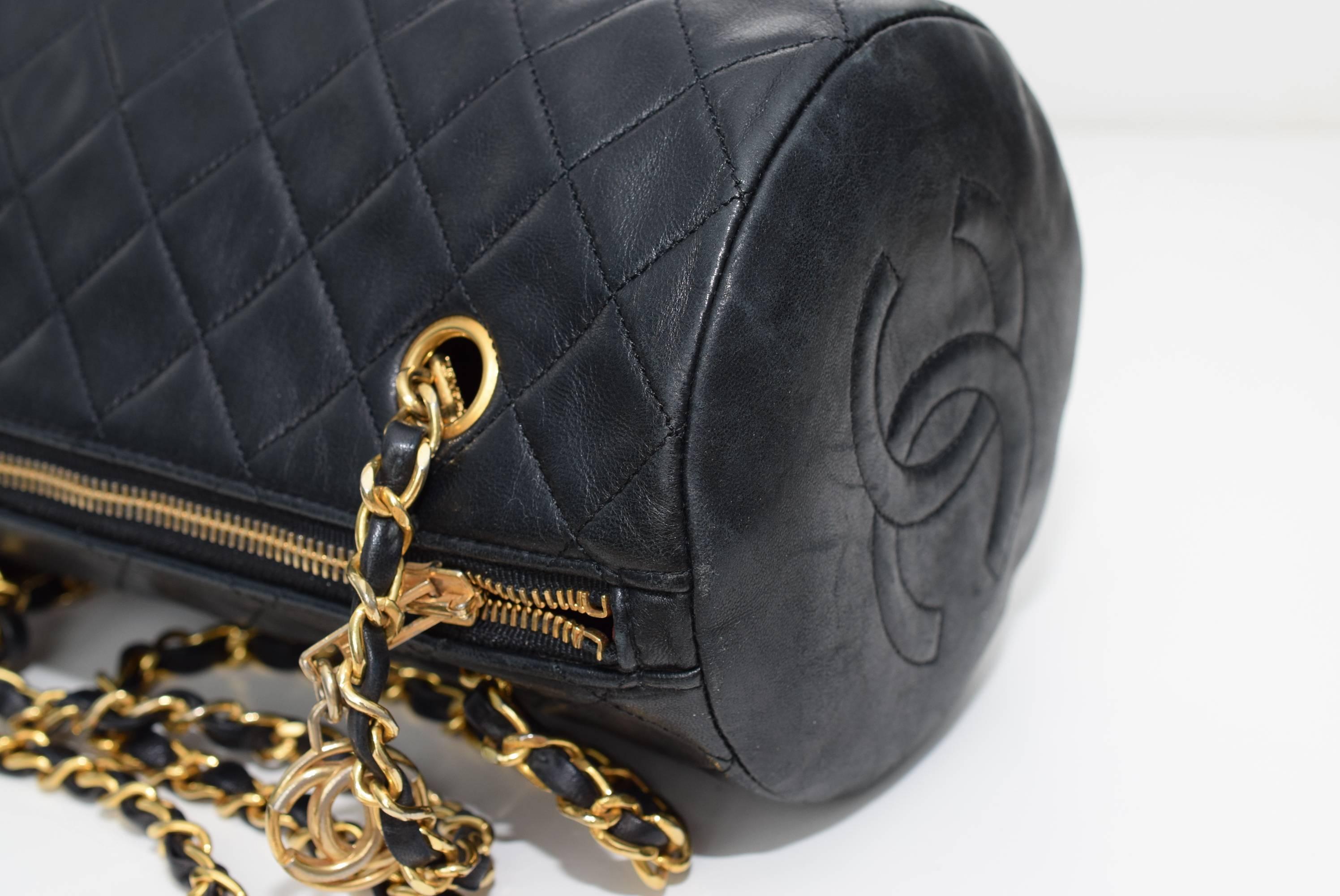 Authentic Vintage Chanel Quilted Chain Cylinder Papillon Shoulder barrel Bag. This bag is in great condition. It comes with original guarantee card and Chanel dust bag. Overall very nice and vintage condition. Inside is in mint condition with one