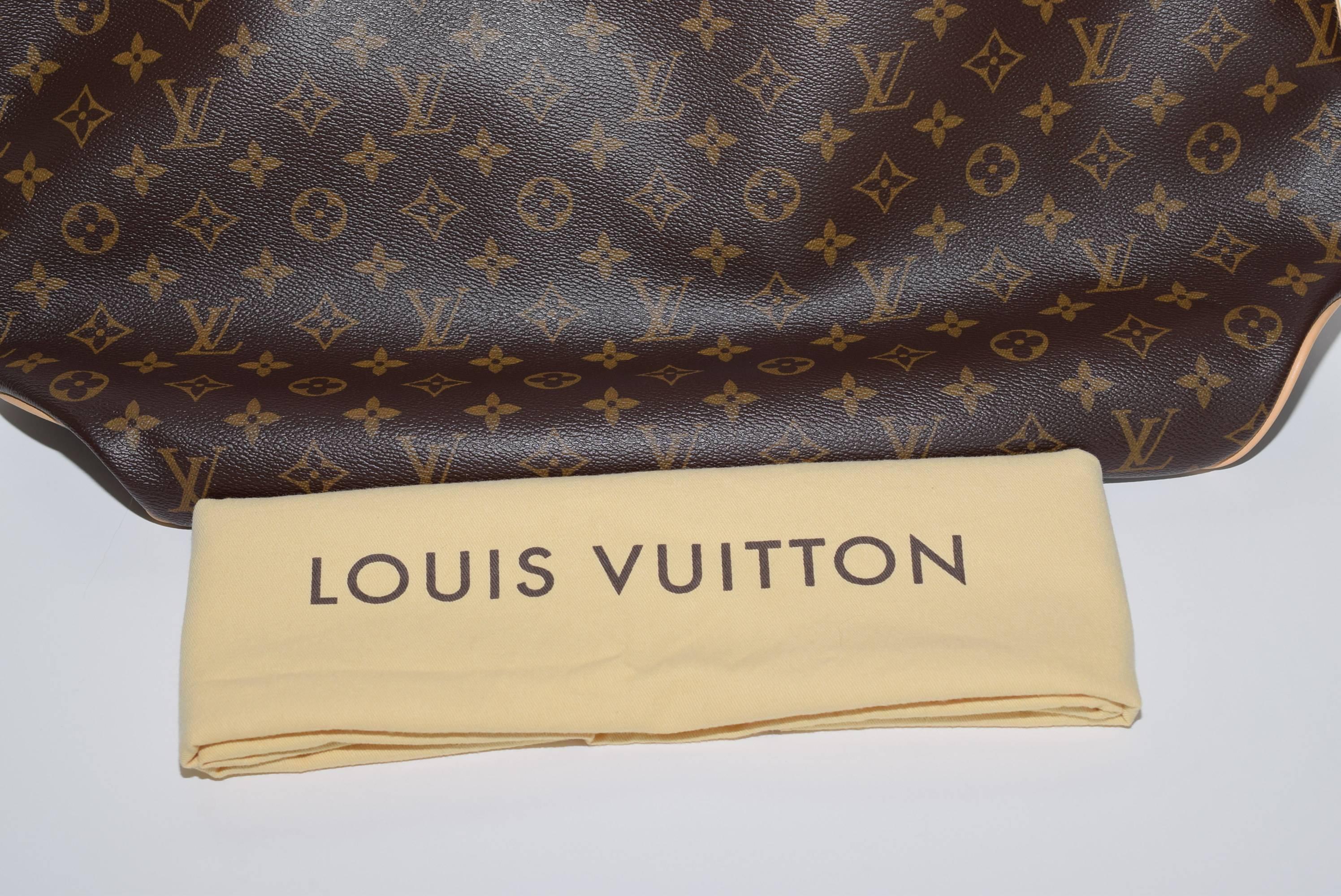 NEW - worn once- Louis Vuitton Delightful GM Style no M41577 in Monogram with beige interior- Date Code MI4100 Made in France!!
Comes with Louis Vuitton dust bag and tag 
 We guarantee everything we sell is 100% authentic. All of our bags are as