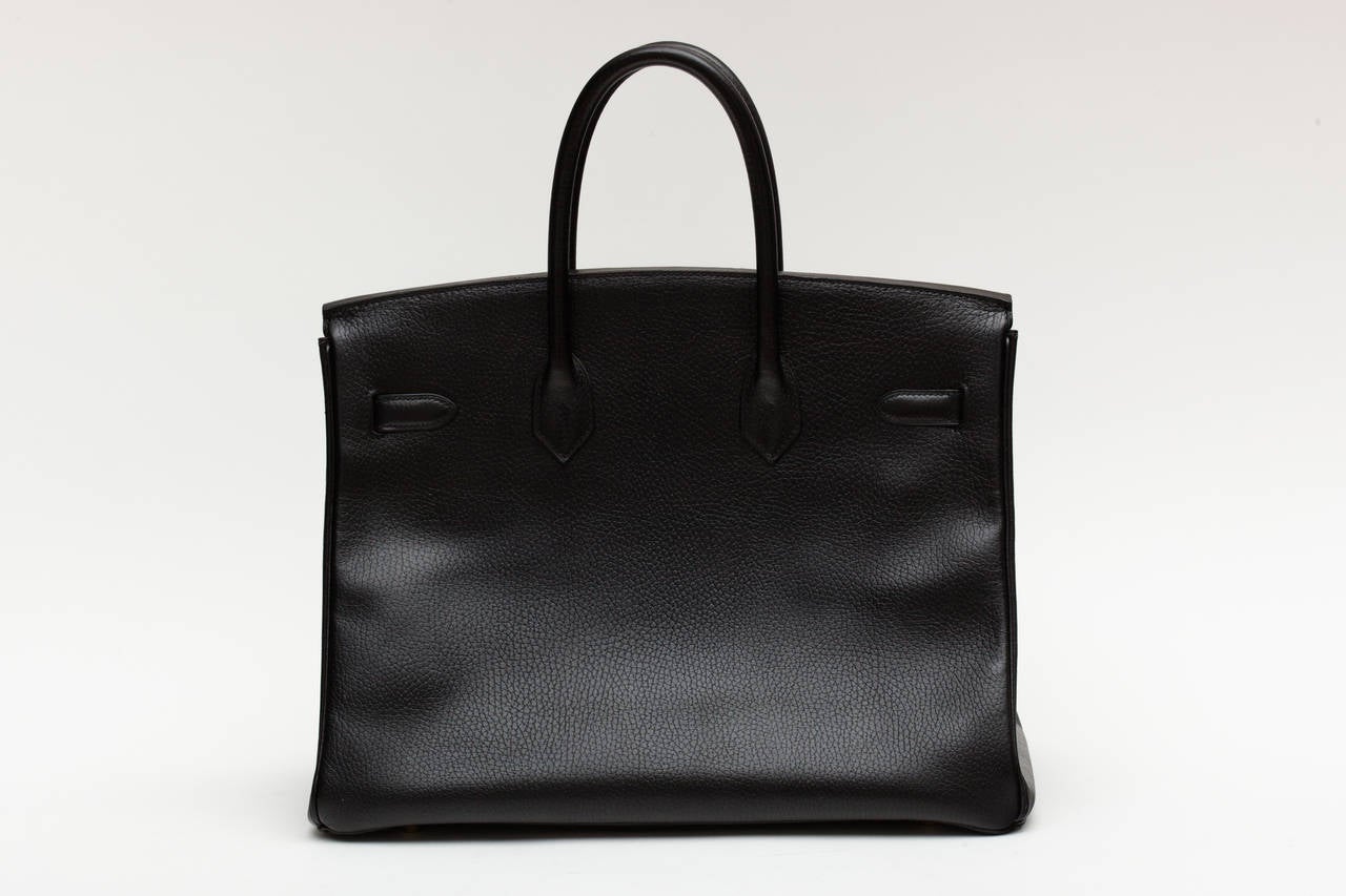 Hermes Black Ardenne 35 cm Birkin Bag in Excellent condition.

Circa 1996. Z circle year. Brass Hardware with only minor wear.

Comes with Hermes Dust bag.

All our bags are guaranteed and warranted to be 100% original