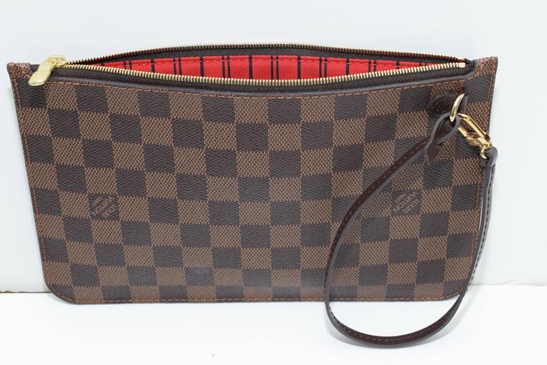 Louis Vuitton Pouch Wristlet | Confederated Tribes of the Umatilla Indian Reservation