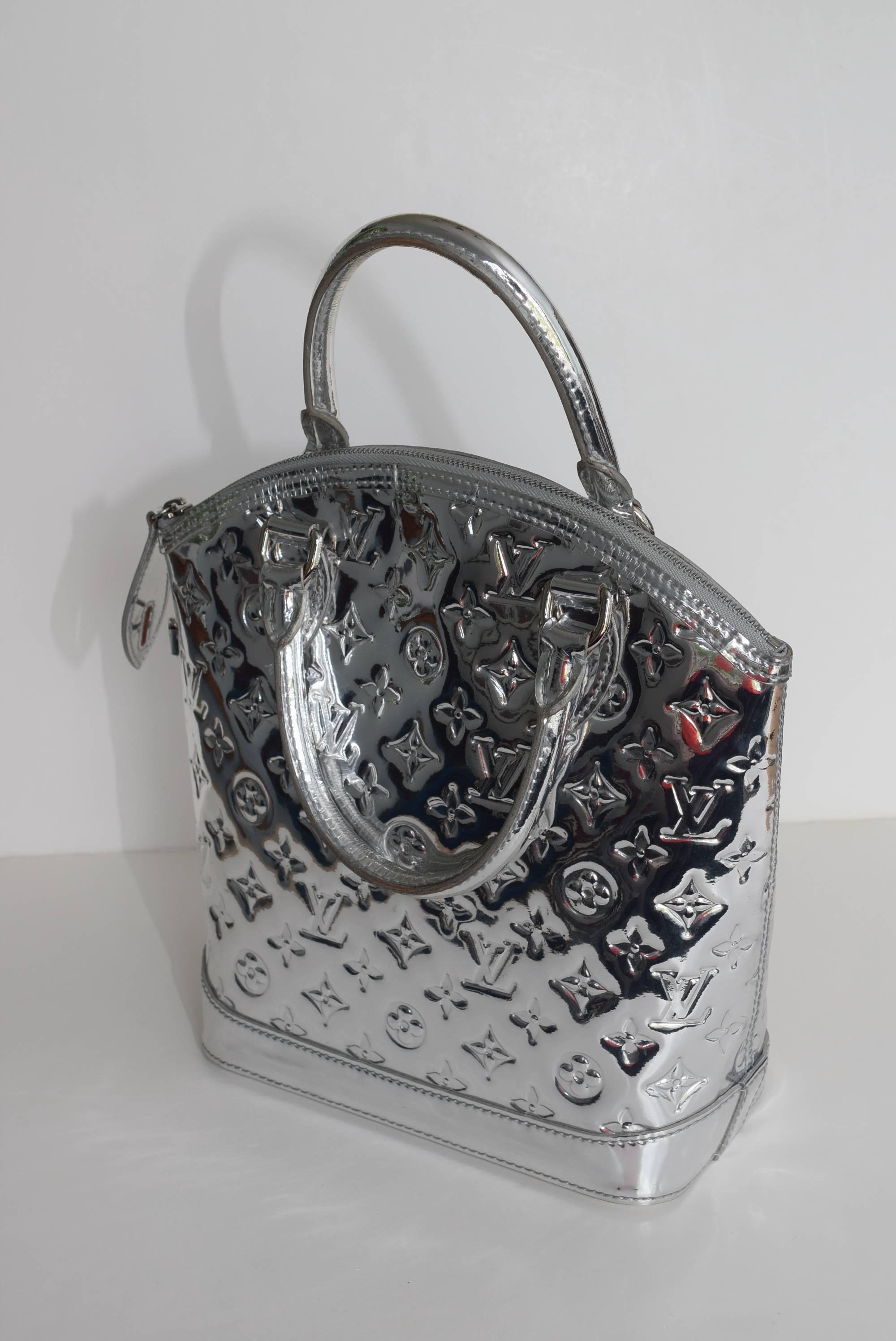 RARE!! Louis Vuitton Limited Edition Silver Monogram Miroir Lockit Bag. 1