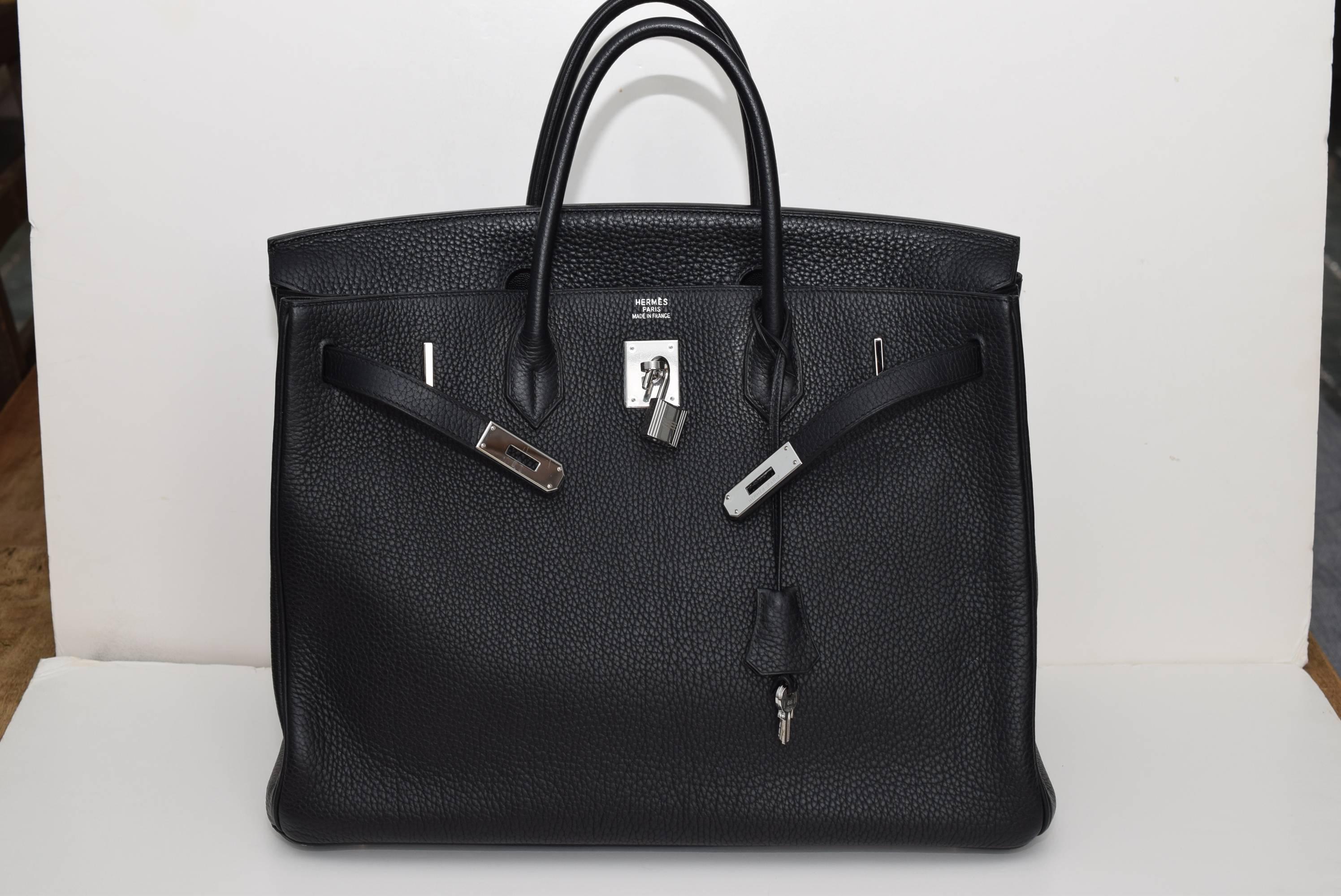 Hermes Birkin 40cm in Black Togo leather with palladium hardware. This bag was purchased on Madison Ave in NYC. It comes with the original receipt.   Barely worn, this Hermes Birkin is truly a staple of success and trend.
I Square (from 2005) Comes
