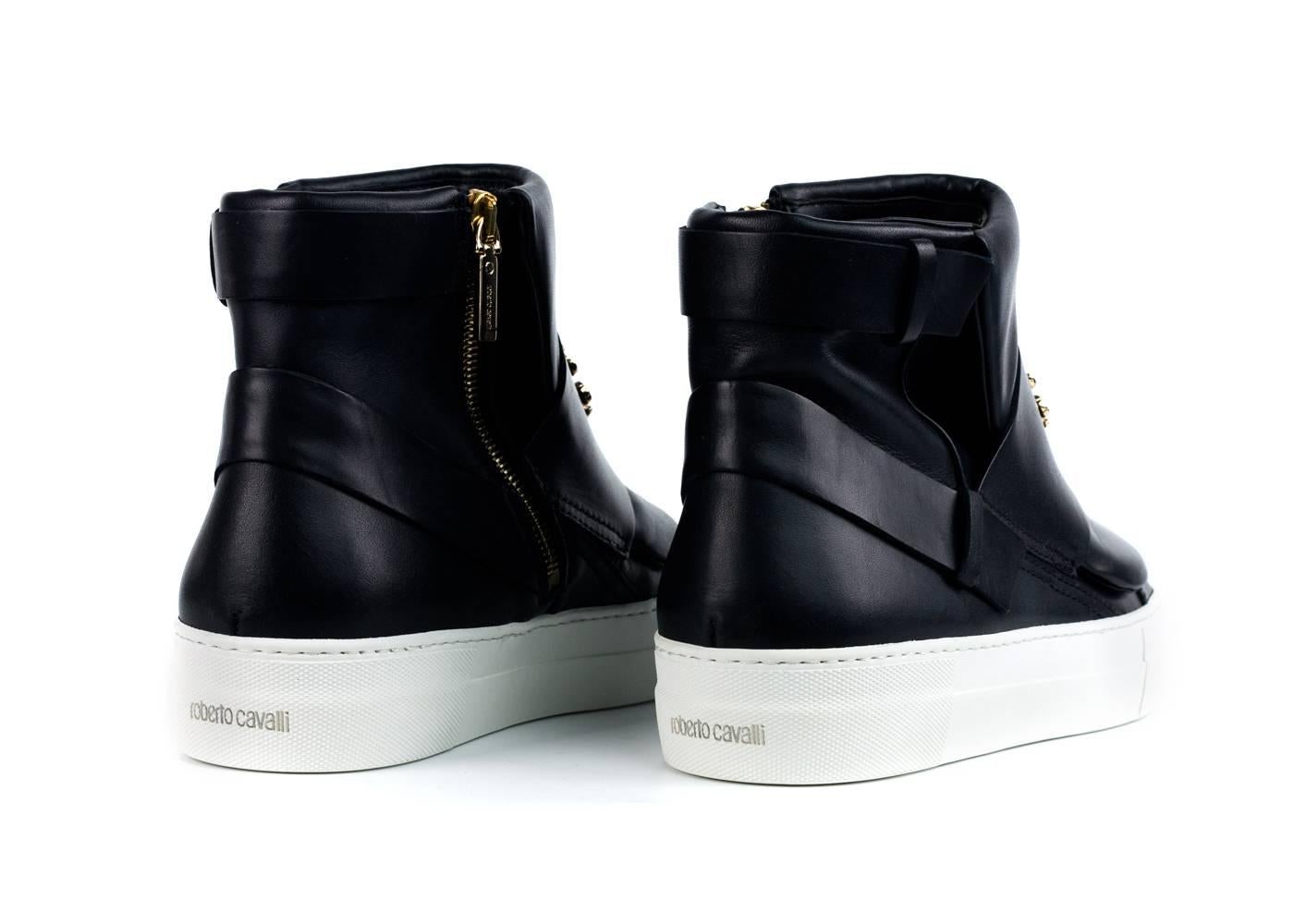 Brand New Roberto Cavalli Sneakers
Original Box & Dust Bag Included
Retails in Stores & Online for $880
Size IT39 / US9 Fits True to Size

Black leather  zipped hi-top sneakers from Roberto Cavalli are a major fashion statement for footwear. These