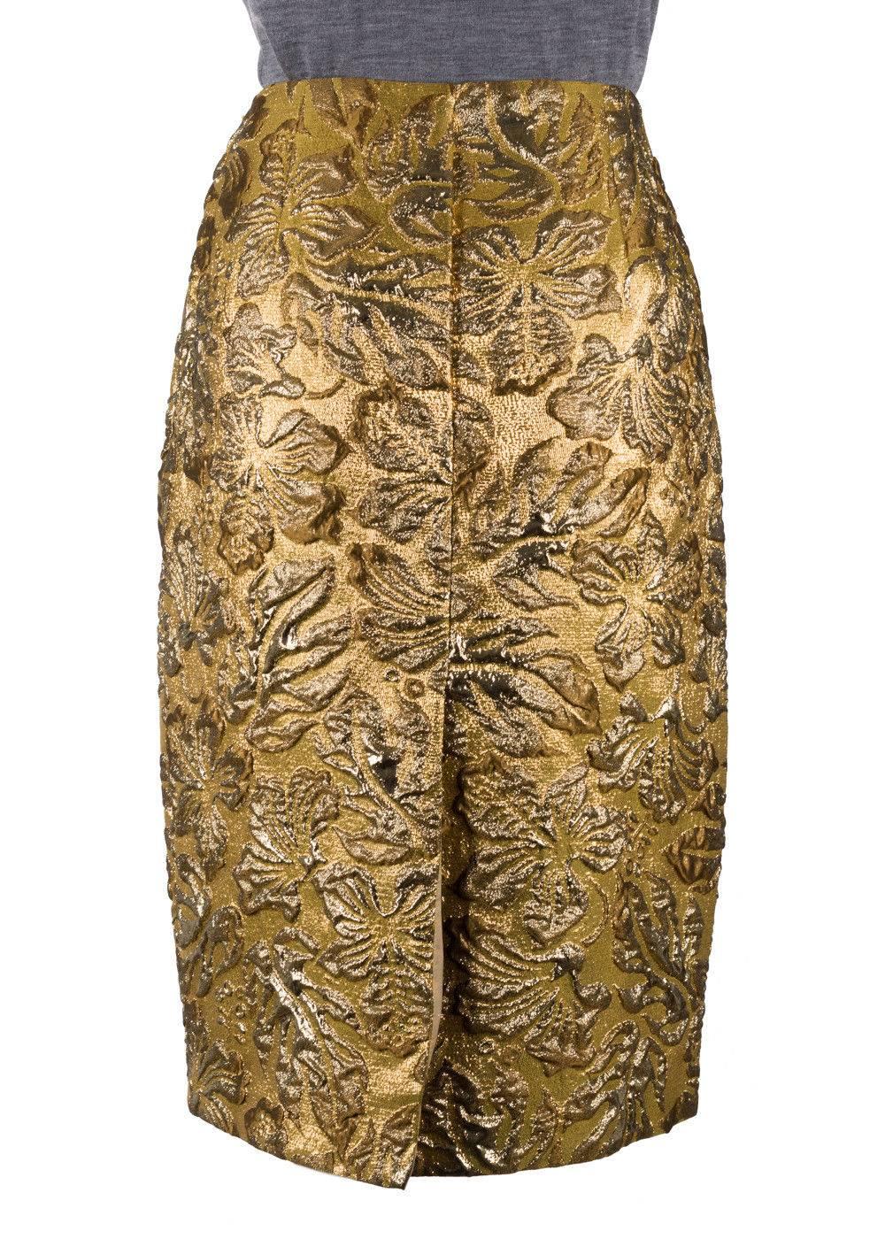 Brand New Prada Womens Metallic Floral Embossed Pencil Skirt
Original Tag
Retails in Stores & Online for $1400
Women's Size EUR 42/ US 4 Fits True to Size

Prada's Floral Metallic Pencil Skirt is a sight to be held. This silk blended masterpiece
