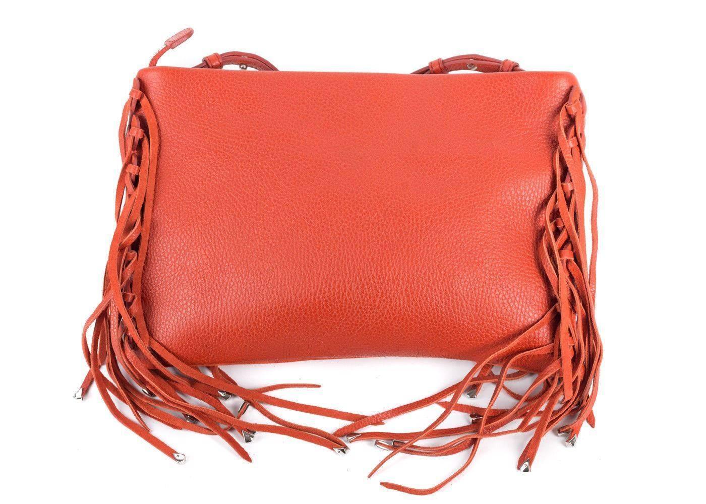 Brand New Roberto Cavalli Suede Fringe Edge Handbag
Original Tag & Sleeper Bag
Retails in Stores & Online for $850
Size 8.5 H x 1 D x 12 L

The orange Roberto Cavalli bag is your Fall season must have. You can pair this suede front beauty