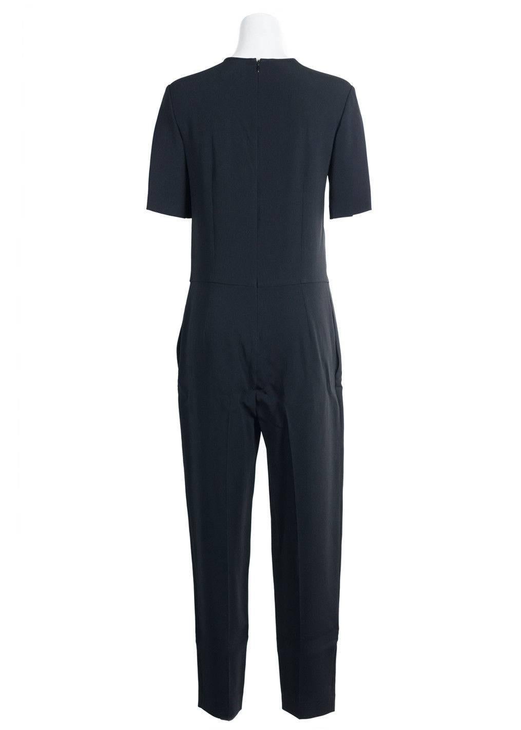Brand New Stella McCartney Slim Cut Jumpsuit 
Original Tags 
Retails in Stores & Online for $1250
Size EUR 42 / US 10

Remain graceful in your Stella McCartney Jumpsuit. This casually elegant one piece features subtle pleating and a slim leg. The