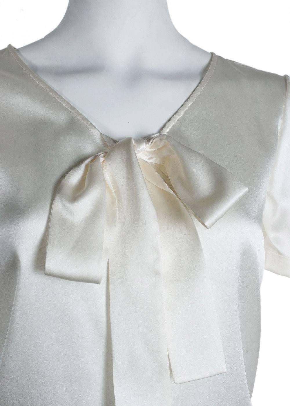Brand New Saint Laurent Blouse
Original Tags & Hanger Included
Retails in Stores & Online for $1075
Size IT38 / US2 Fits True to Size

Saint Laurent's off white blouse made from 100% Silk for the ultimate soft and smooth feel to your skin. This silk