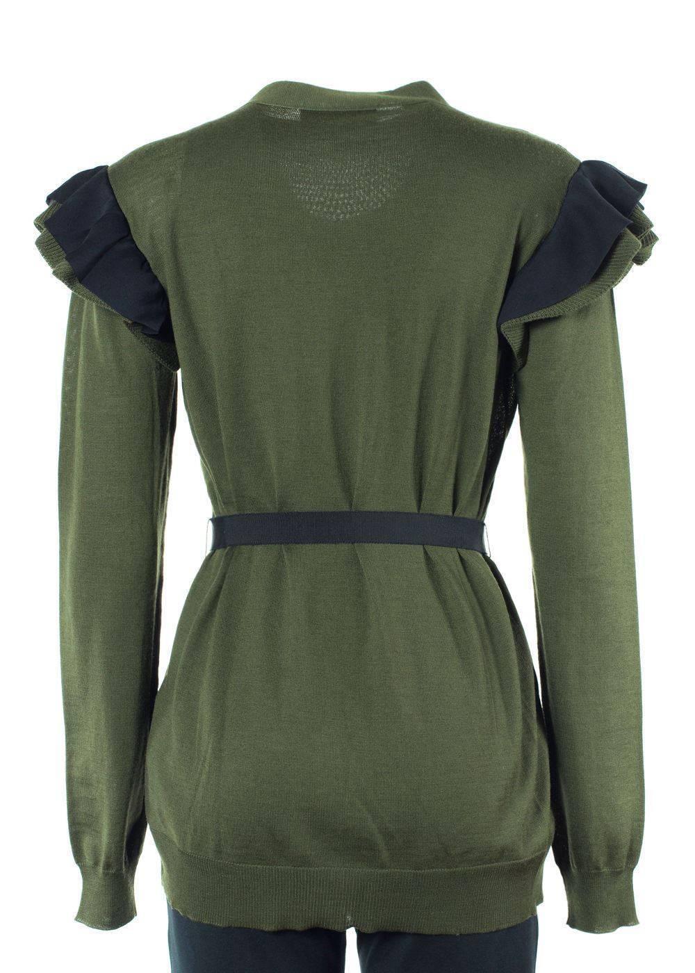 Brand New & Fits True to Size
Size Large/IT 46
100% Fleece Wool 

This Valentino Olive Open Knit cardigan made of a wool is a must have to any women's closet. Perfect for everyday wear, the office, or a night out. Easy to pair with jeans, trousers