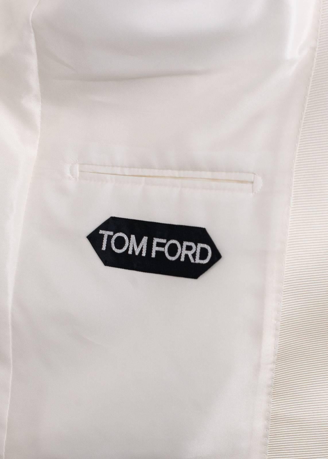 Peak anyone's interest in your Tom Ford Shelton jacket. This cocktail Jacket features a textured peak lapel, single button closure, and rich silk blended textures. You can pair this cocktail jacket with dark streamlined slacks and polished leather
