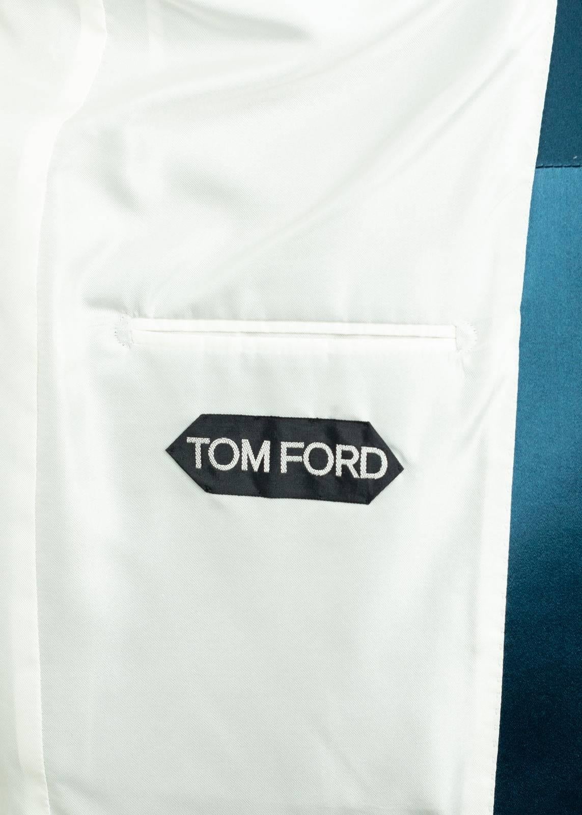 Invite all pleasurable eyes in with your Tom Ford Velvet Jacket. This strikingly smooth Shelton features a satin shawl lapel, silk blended interior, and concealed sleeve hem closure. You can pair this suave unit with and all white ensemble for