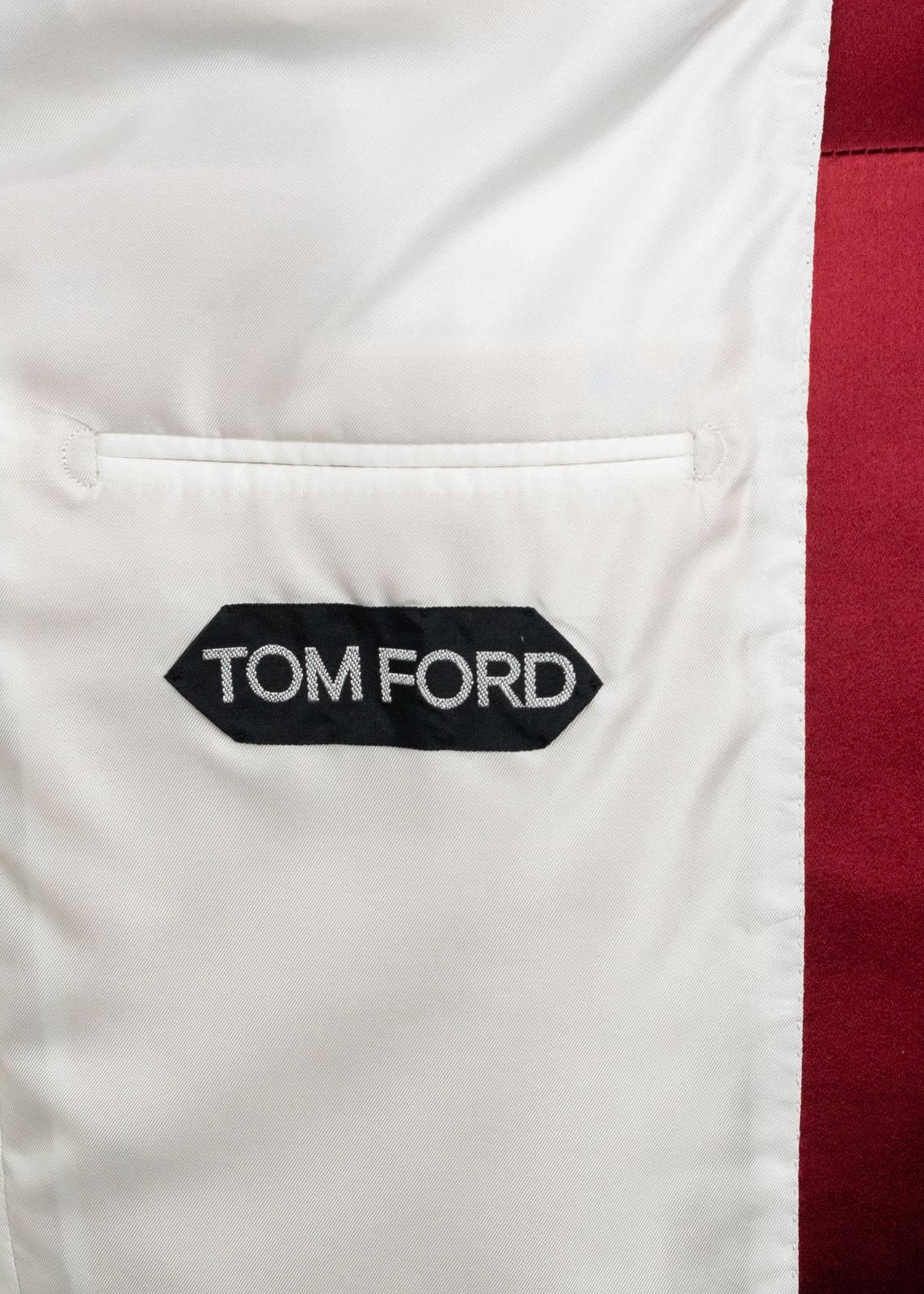 Invite all pleasurable eyes in with your Tom Ford Velvet Jacket. This strikingly smooth Shelton features a satin shawl lapel, silk blended interior, and concealed sleeve hem closure. You can pair this suave unit with and all white ensemble for