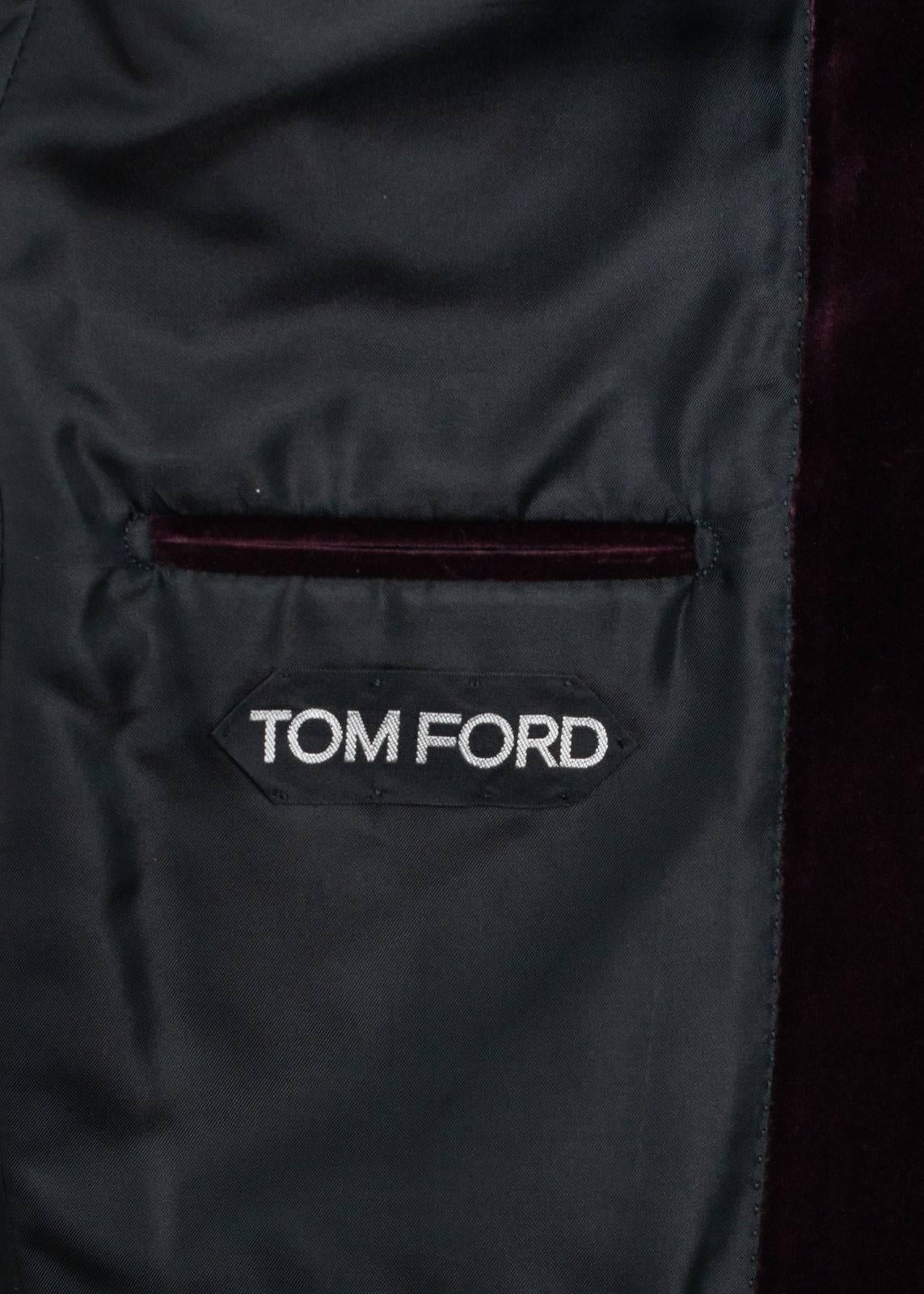 Set the tone of the evening  in with your Tom Ford Velvet Jacket. This richly smooth Shelton features a notch lapel, silk blended interior, and unfinished hem jacket sleeves. You can pair this suave unit with and all white ensemble for maximum