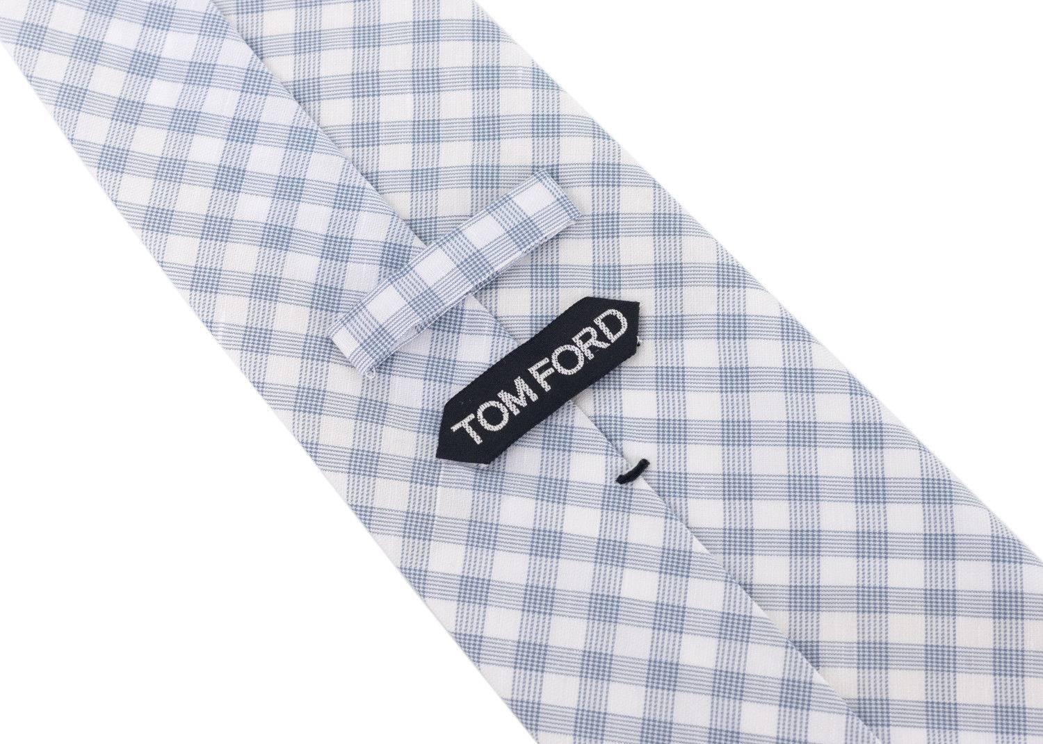 talian luxury brand, Tom Ford, has crafted these gorgeous Cotton Blend Tie for important special occasions and professional events. The tie is great to pair with your favorite solid color button down and blazers with your chosen pair or classic
