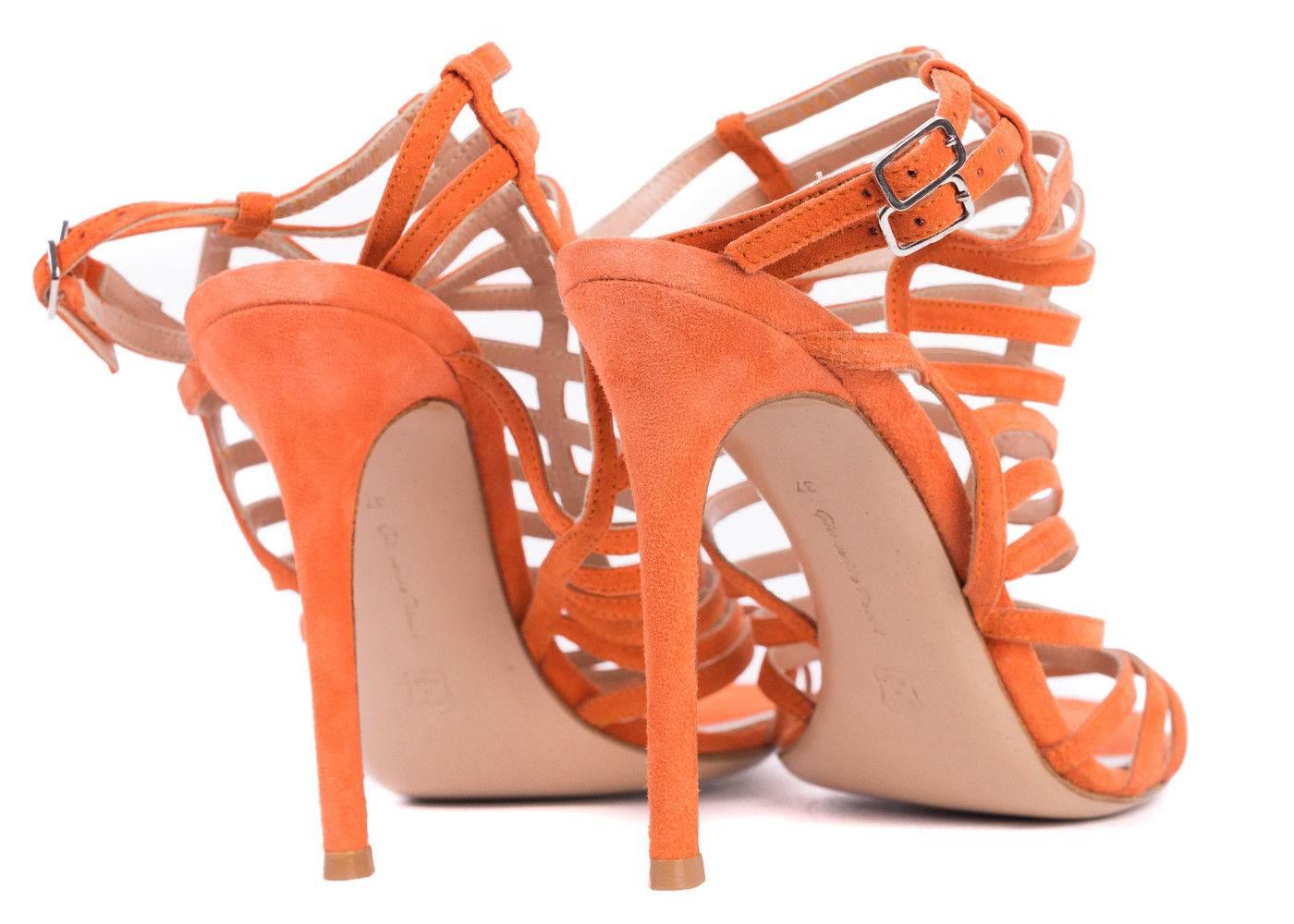 Make a sweet stride with this pair of caged sandals by Gianvito Rossi. This is a redefined gladiator silhouette crafted from vivid orange Italian suede, boasting a unique caged upper and delicate ankle straps. This sandal will be sure to accent your