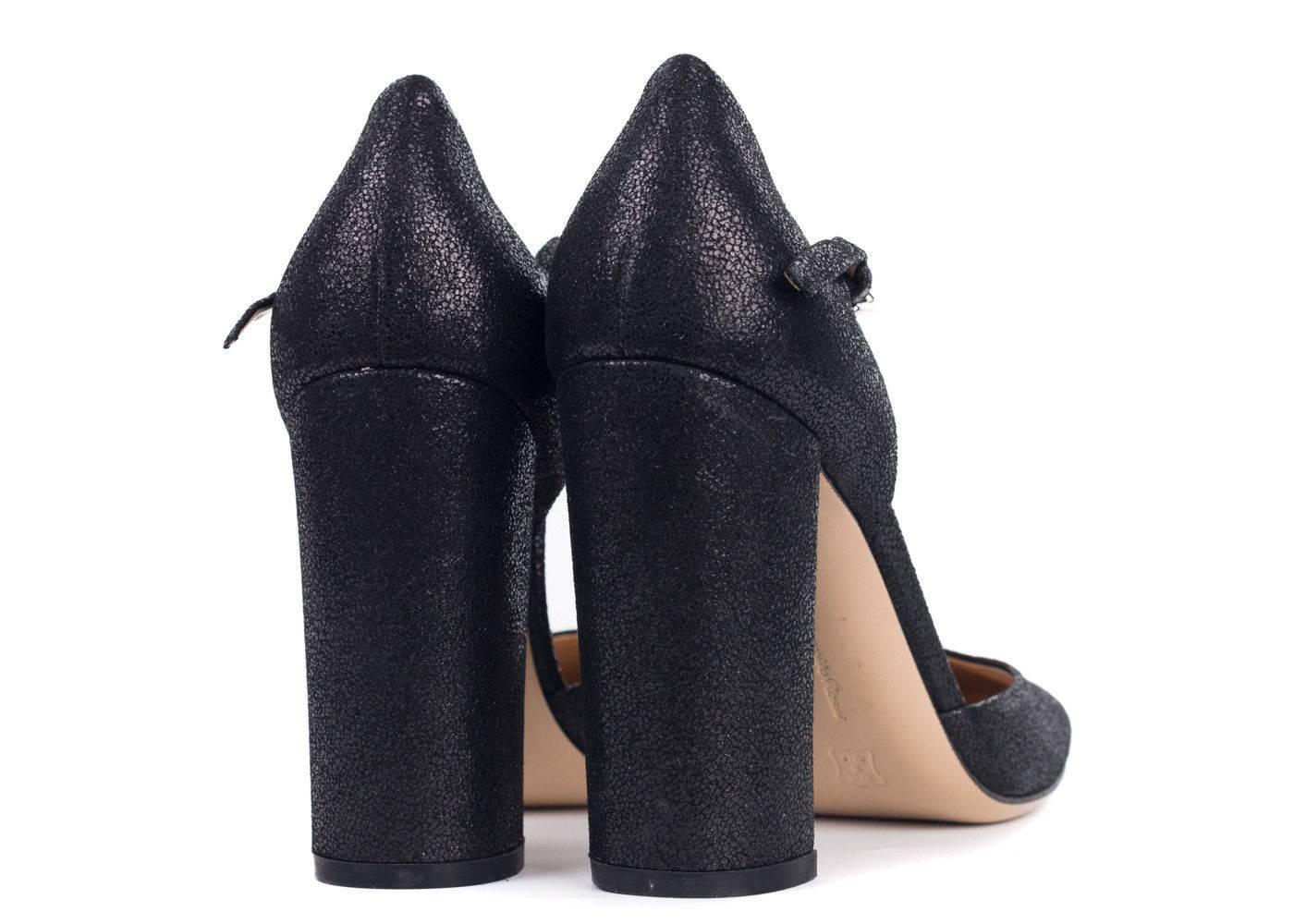 Revamp your wardrobe with a staple from Gianvito Rossi. Versatile enough for the office or day party this beautiful core silhouette features a black glitter suede, with a delicate ankle strap and high block heel. Pair with your dark ensemble for a