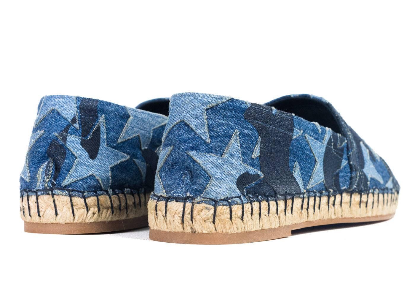 Valentino Garavani's espadrilles are crafted of blue denim appliquéd with light blue star and indigo camouflage self-patches.


0.5