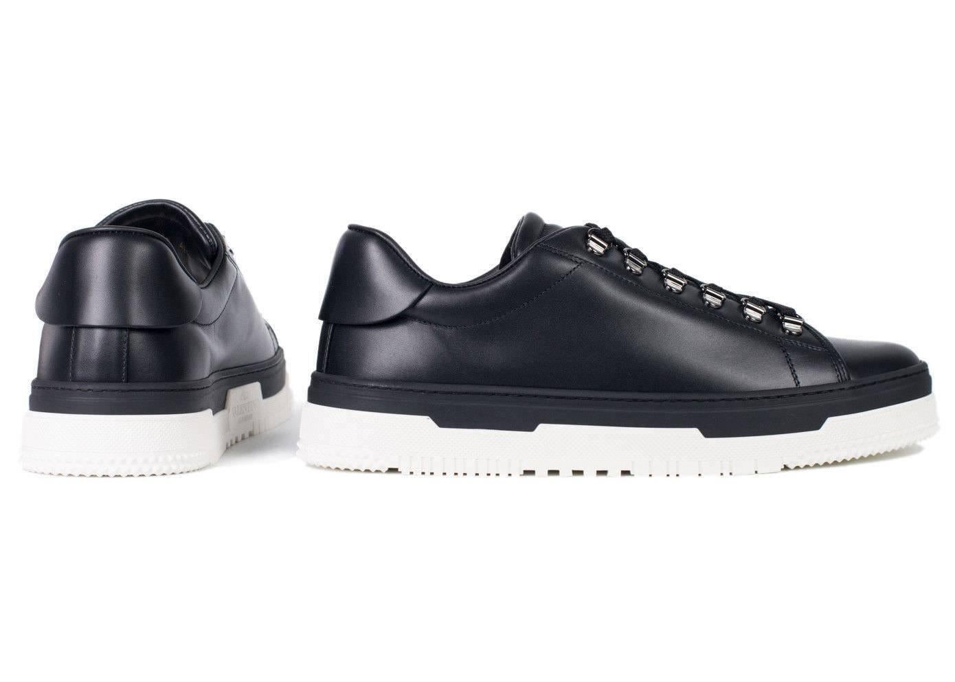 The Valentino Lace Up Platform sneakers are the new modern. This shoe features a futuristic dual black and white rugged sole paired with smooth leather. You can combine this shoe with all black denim and take on the day.

Composition Leather
Low