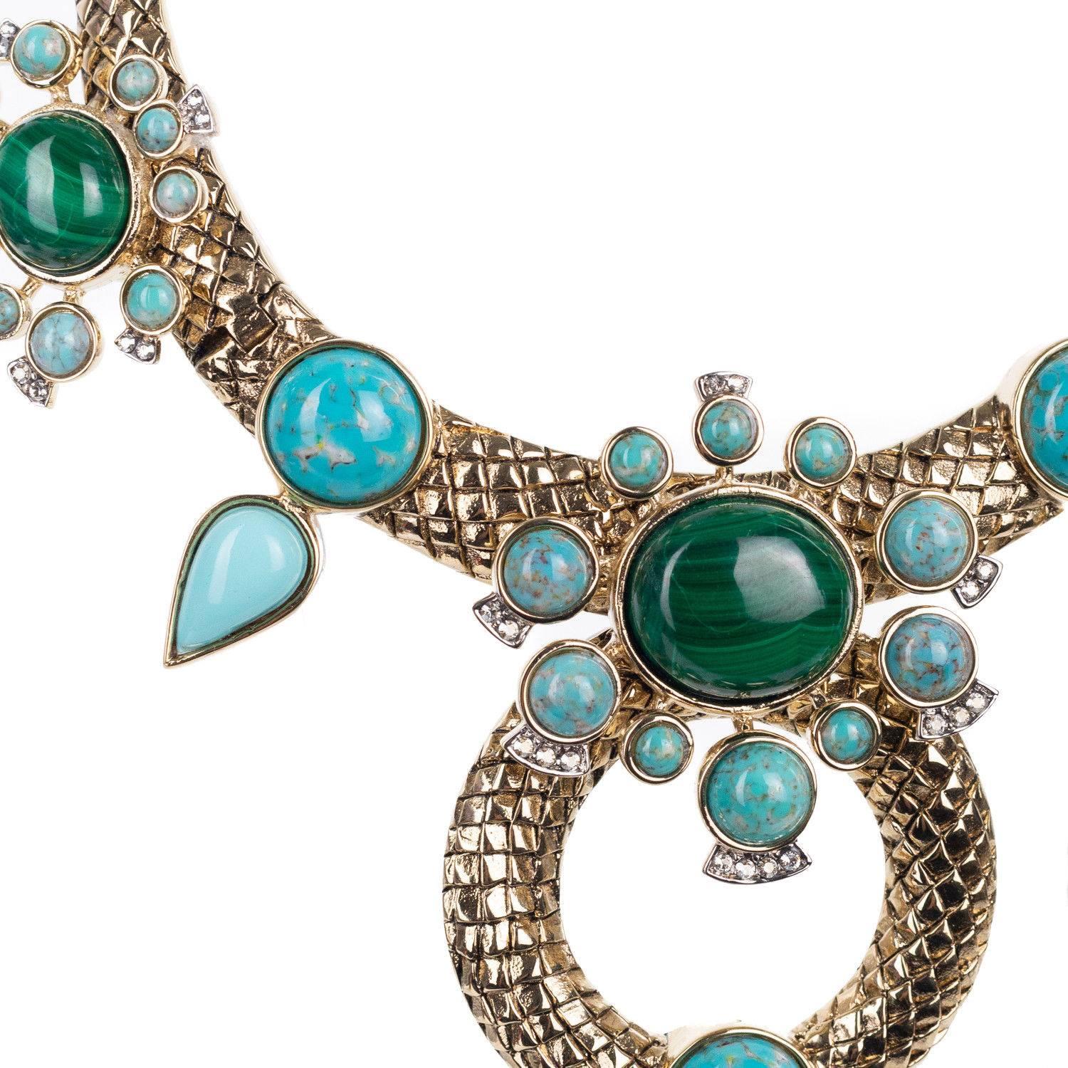 Bohemian Gold and Turquoise Necklace is the perfect evening statement piece or for those extravagant poolside parties. Featuring etched gold tone brass collar embellished with malachite starbursts and turquoise colored stones in teardrop design with