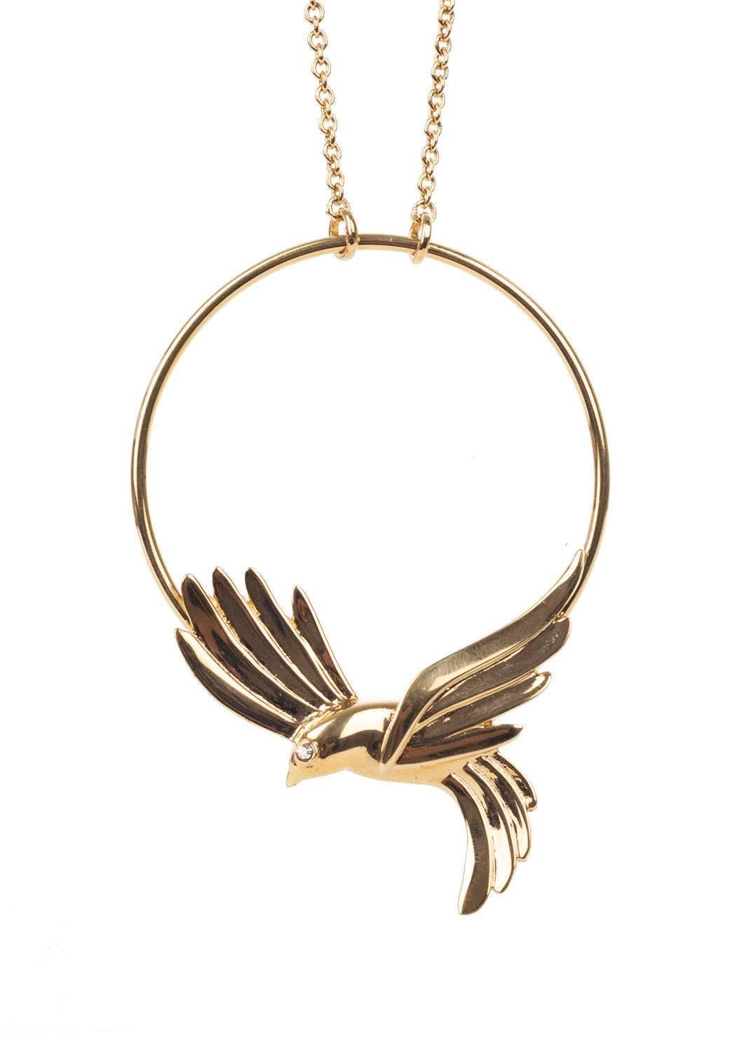 Roberto Cavalli gold plated necklace. This necklace featurs a long gold chain with a bird pendant design encrusted with a single swarovski crystal. Perfect minimalistic piece for an everyday wear. This necklace is great on all outfits.

