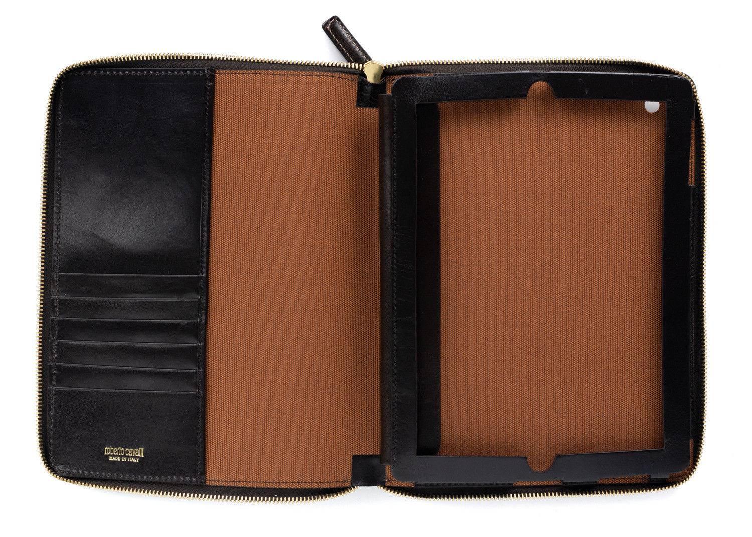 Carry your device in style with this Roberto Cavalli Shoulder Strap iPad sleeve cover. The black leather iPad case with gold-tone hardware and leopard print throughout highlighs the brands craftsmanship. This sleeve cover will make a stylish and